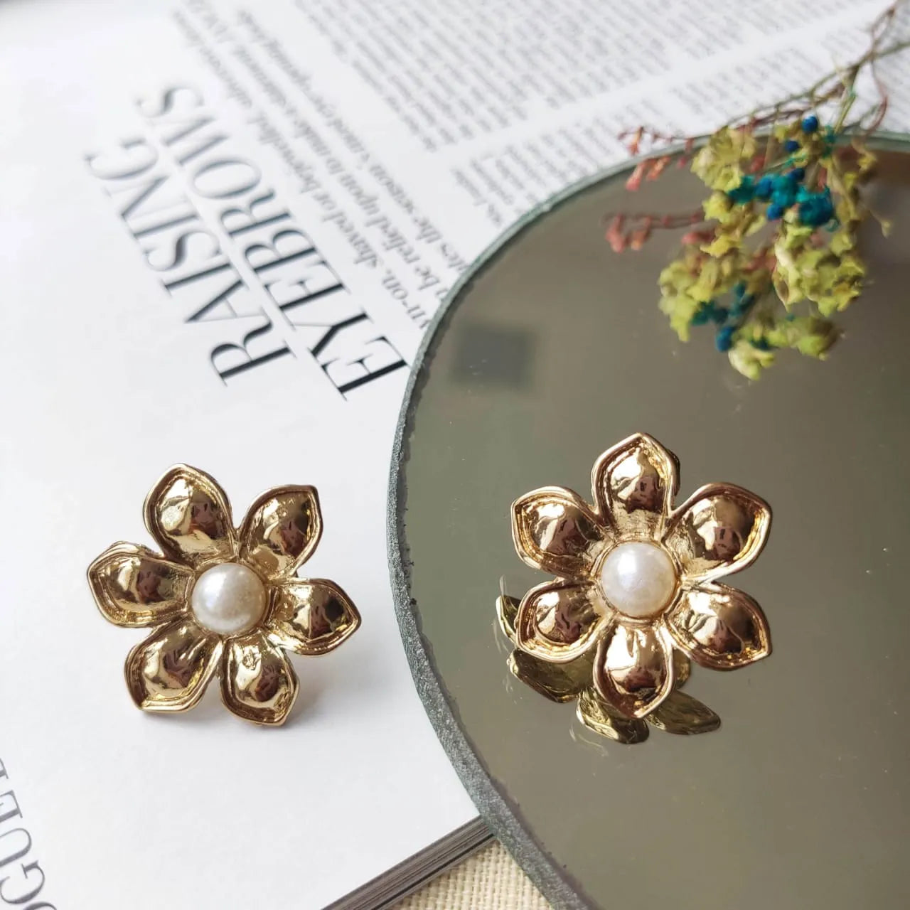 TFC Sunflower Whisperers Gold Plated Pearl Stud Earrings- Discover daily wear gold earrings including stud earrings, hoop earrings, and pearl earrings, perfect as earrings for women and earrings for girls.Find the cheapest fashion jewellery which is anti-tarnish only at The Fun company