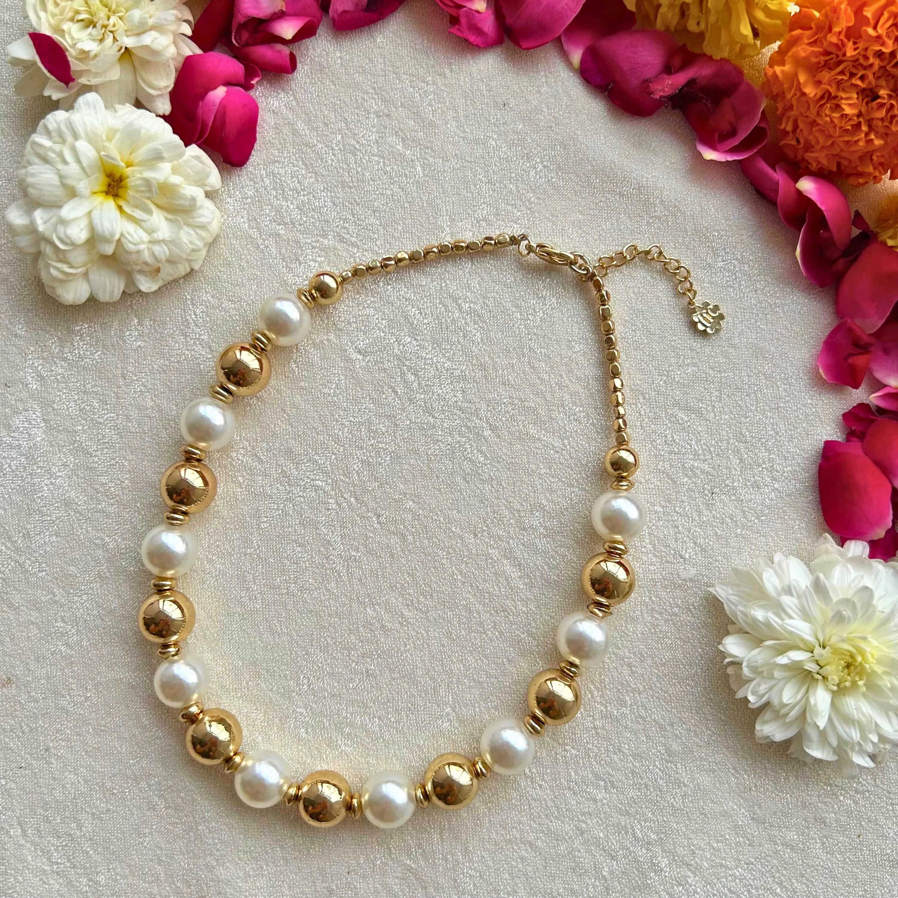 TFC Pearl and Gold Bead Choker Necklace-Enhance your elegance with our collection of gold-plated necklaces for women. Choose from stunning pendant necklaces, chic choker necklaces, and trendy layered necklaces. Our sleek and dainty designs are both affordable and anti-tarnish, ensuring lasting beauty. Enjoy the cheapest fashion jewellery, lightweight and stylish- only at The Fun Company.