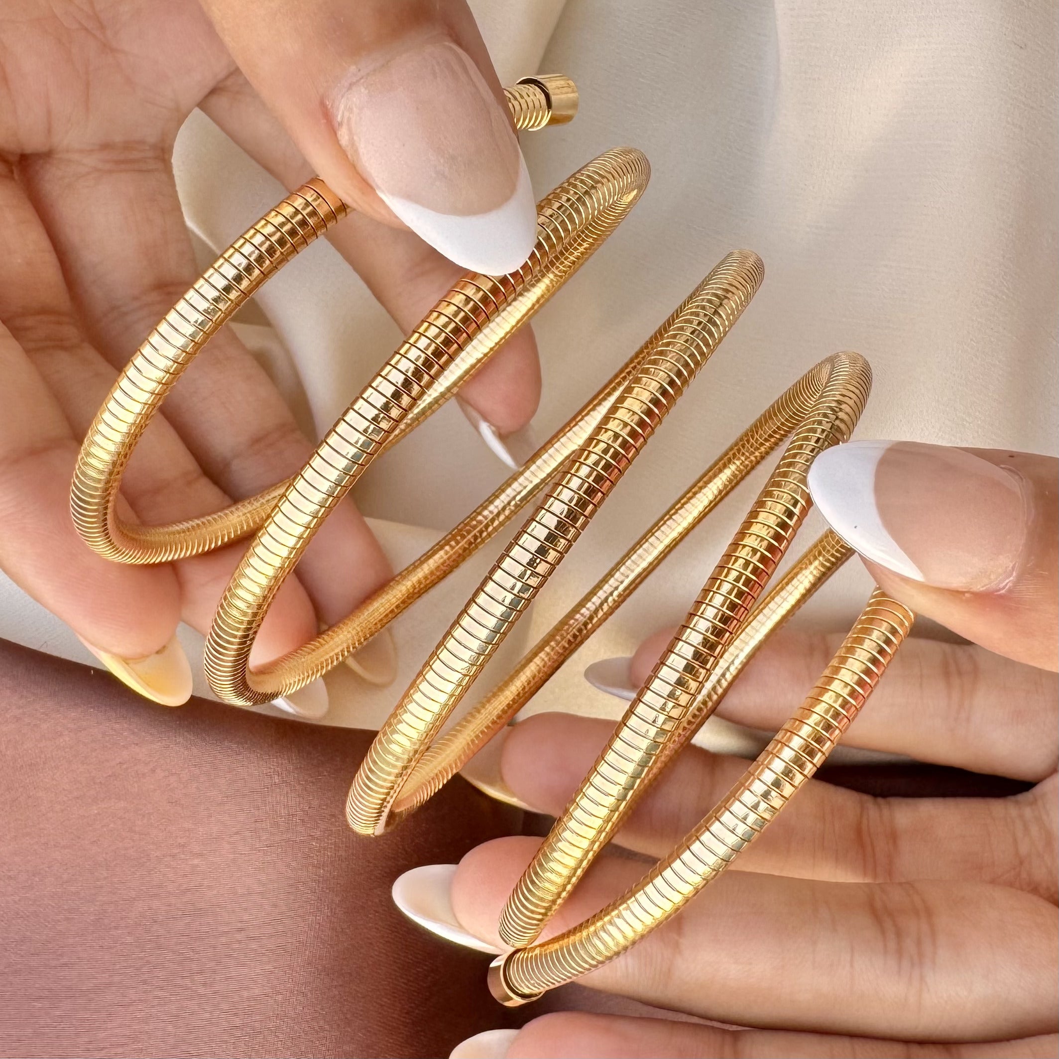TFC Spiral Gold Plated Bracelet Bangle