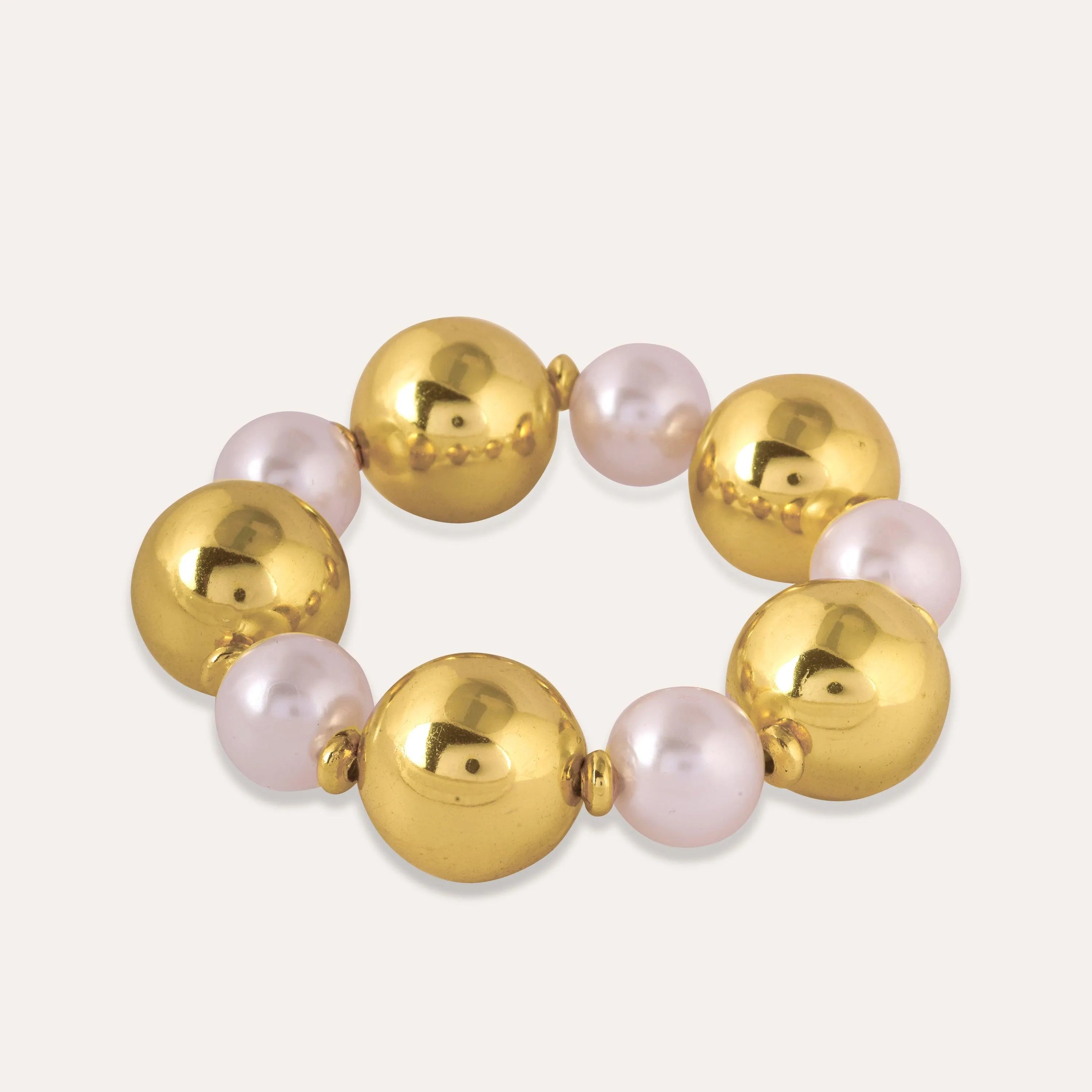 TFC Bold And Gold Pearl Bead Bracelet-Discover our stunning collection of stylish bracelets for women, featuring exquisite pearl bracelets, handcrafted beaded bracelets, and elegant gold-plated designs. Enjoy cheapest anti-tarnish fashion jewellery and long-lasting brilliance onl