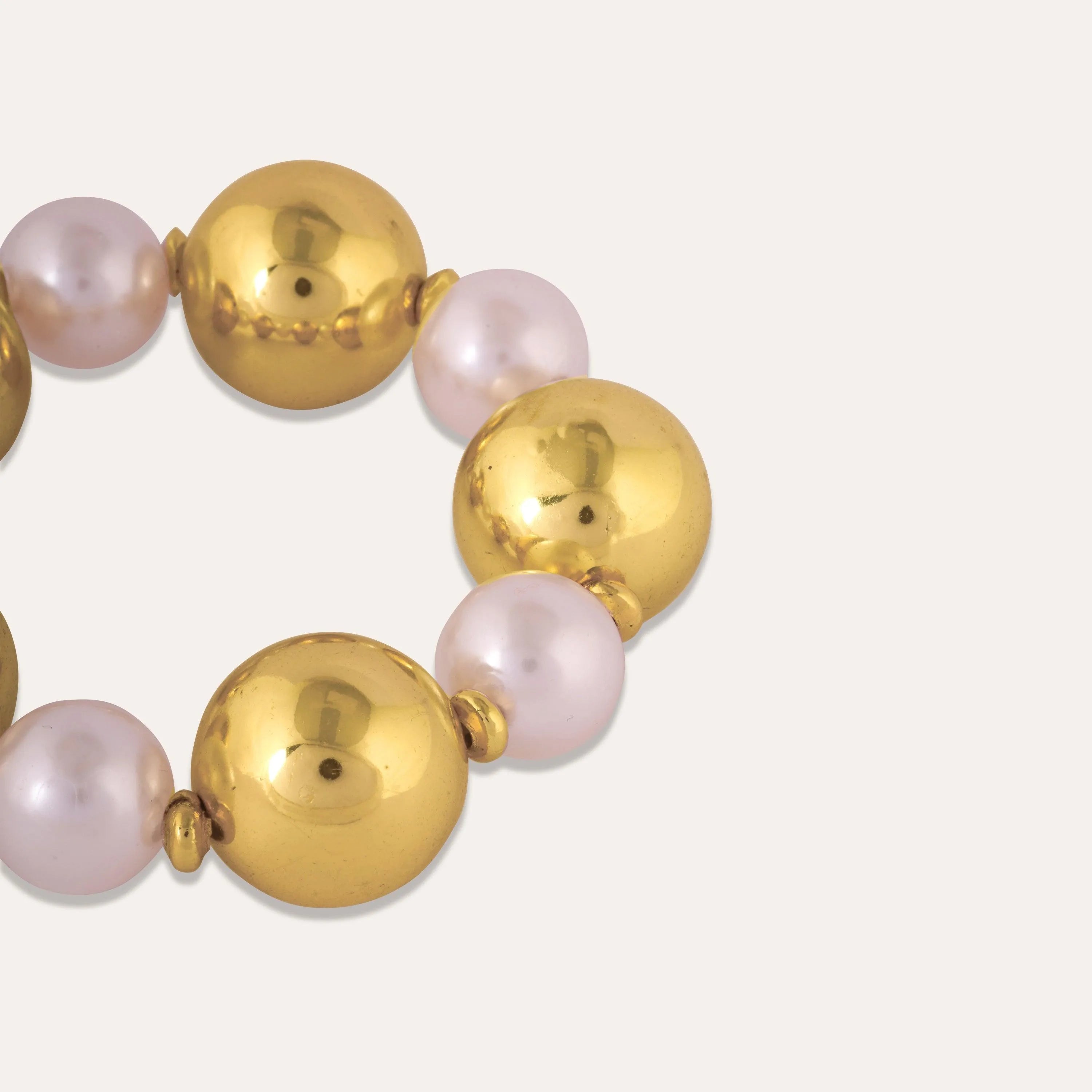 TFC Bold And Gold Pearl Bead Bracelet-Discover our stunning collection of stylish bracelets for women, featuring exquisite pearl bracelets, handcrafted beaded bracelets, and elegant gold-plated designs. Enjoy cheapest anti-tarnish fashion jewellery and long-lasting brilliance onl