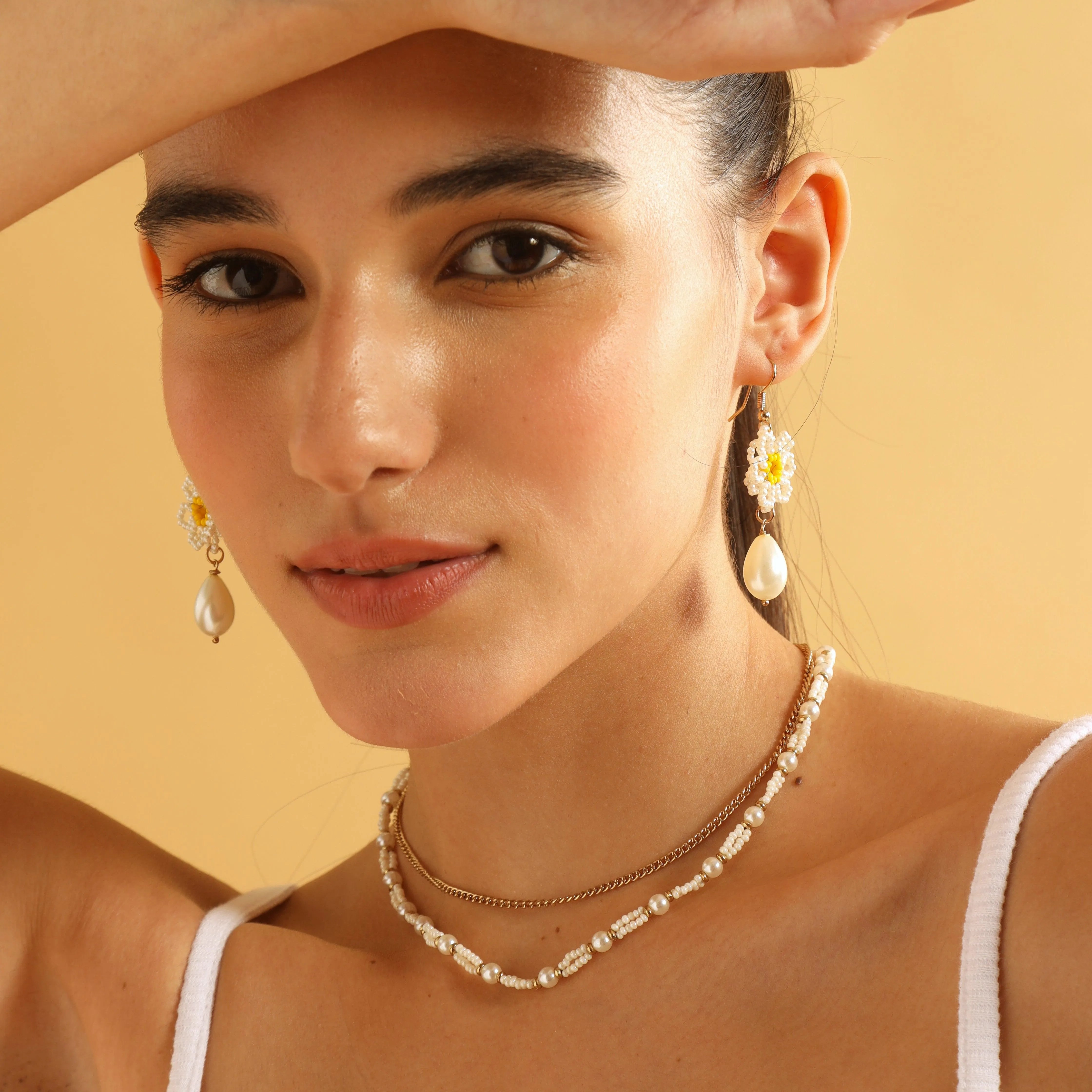 TFC Y2K Sunflower Beaded Dangler Earrings-Discover daily wear gold earrings including stud earrings, hoop earrings, and pearl earrings, perfect as earrings for women and earrings for girls.Find the cheapest fashion jewellery which is anti-tarnish only at The Fun company