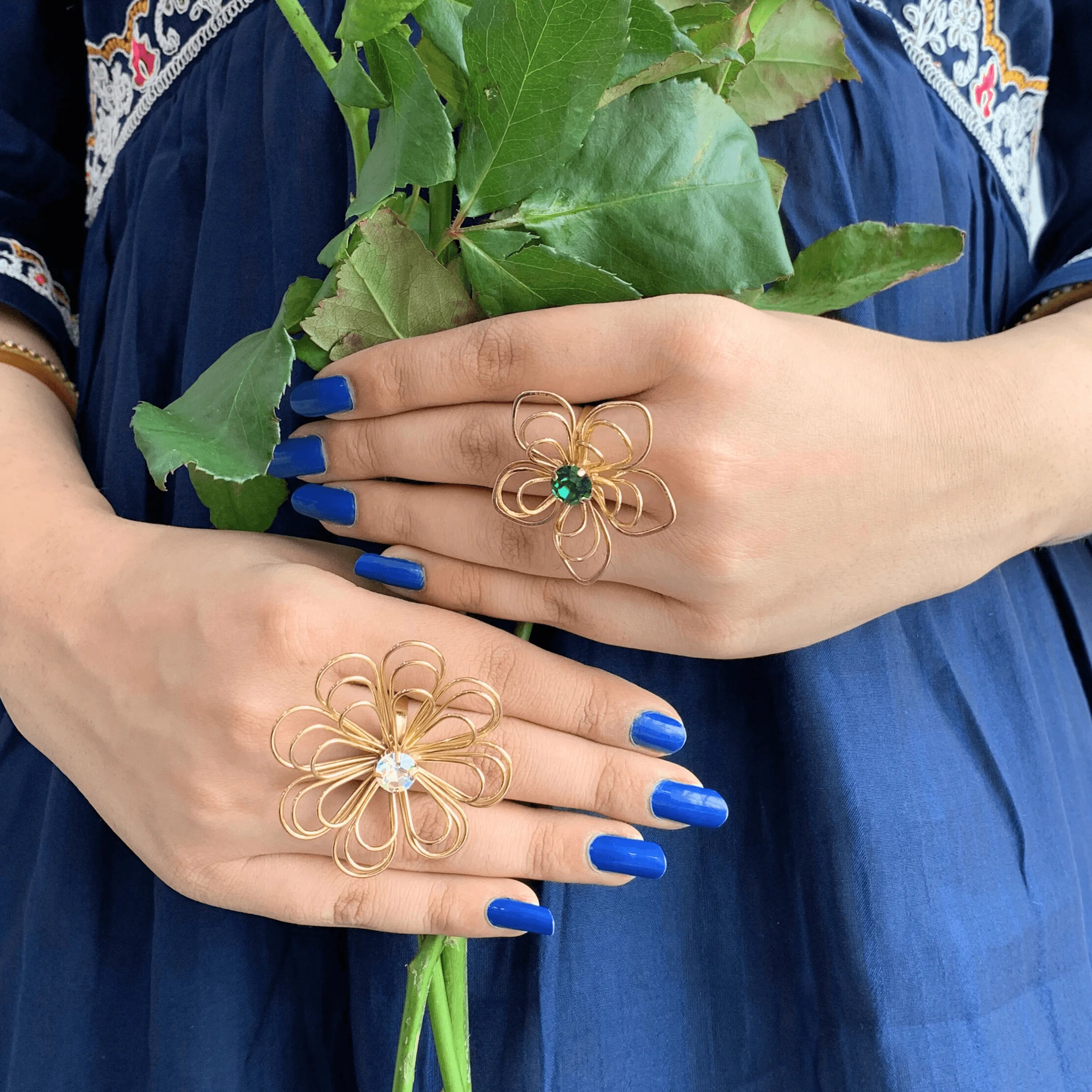 TFC Floral Emerald Statement Gold Plated Adjustable Ring-Elevate your style with our exquisite collection of gold-plated adjustable rings for women, including timeless signet rings. Explore cheapest fashion jewellery designs with anti-tarnish properties, all at The Fun Company with a touch of elegance