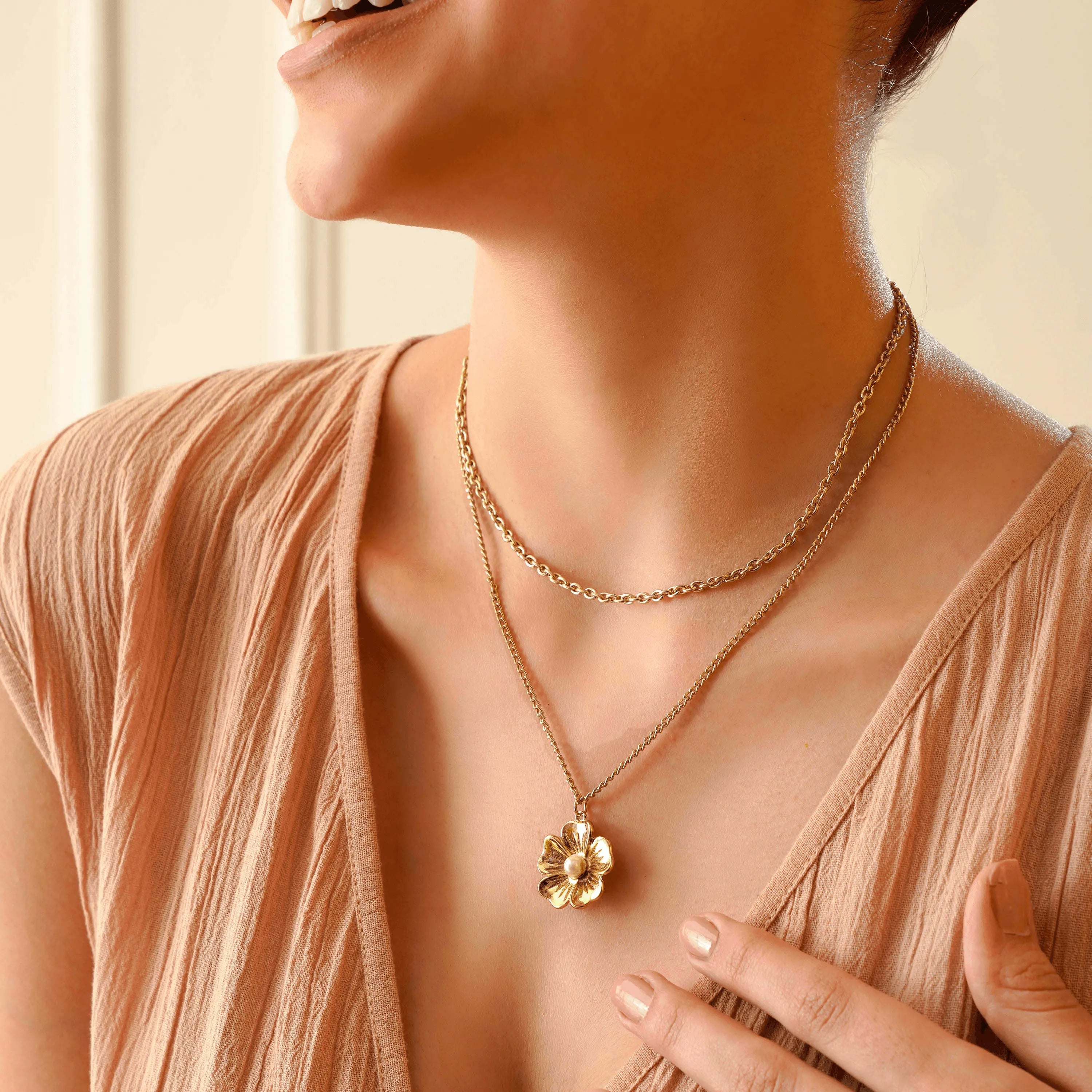 TFC Layered Chain Floral Gold Plated Necklace-Enhance your elegance with our collection of gold-plated necklaces for women. Choose from stunning pendant necklaces, chic choker necklaces, and trendy layered necklaces. Our sleek and dainty designs are both affordable and anti-tarnish, ensuring lasting beauty. Enjoy the cheapest fashion jewellery, lightweight and stylish- only at The Fun Company
