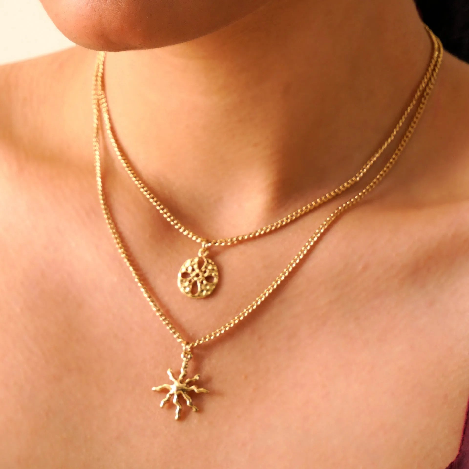 TFC Sunny Charms Layered Gold Plated Necklace-Enhance your elegance with our collection of gold-plated necklaces for women. Choose from stunning pendant necklaces, chic choker necklaces, and trendy layered necklaces. Our sleek and dainty designs are both affordable and anti-tarnish, ensuring lasting beauty. Enjoy the cheapest fashion jewellery, lightweight and stylish- only at The Fun Company