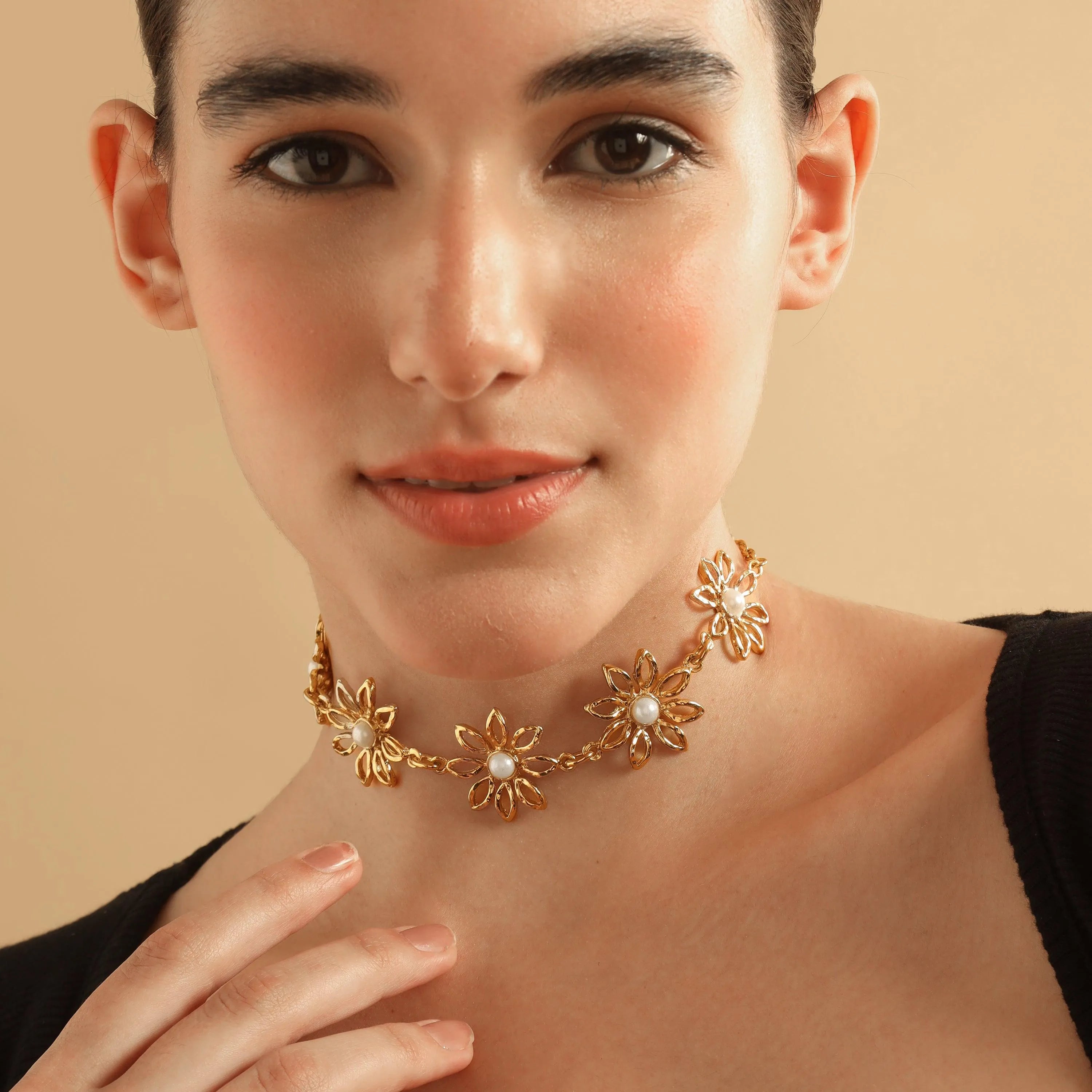 TFC Daisy Gold Plated Pearl Necklace-Enhance your elegance with our collection of gold-plated necklaces for women. Choose from stunning pendant necklaces, chic choker necklaces, and trendy layered necklaces. Our sleek and dainty designs are both affordable and anti-tarnish, ensuring lasting beauty. Enjoy the cheapest fashion jewellery, lightweight and stylish- only at The Fun Company