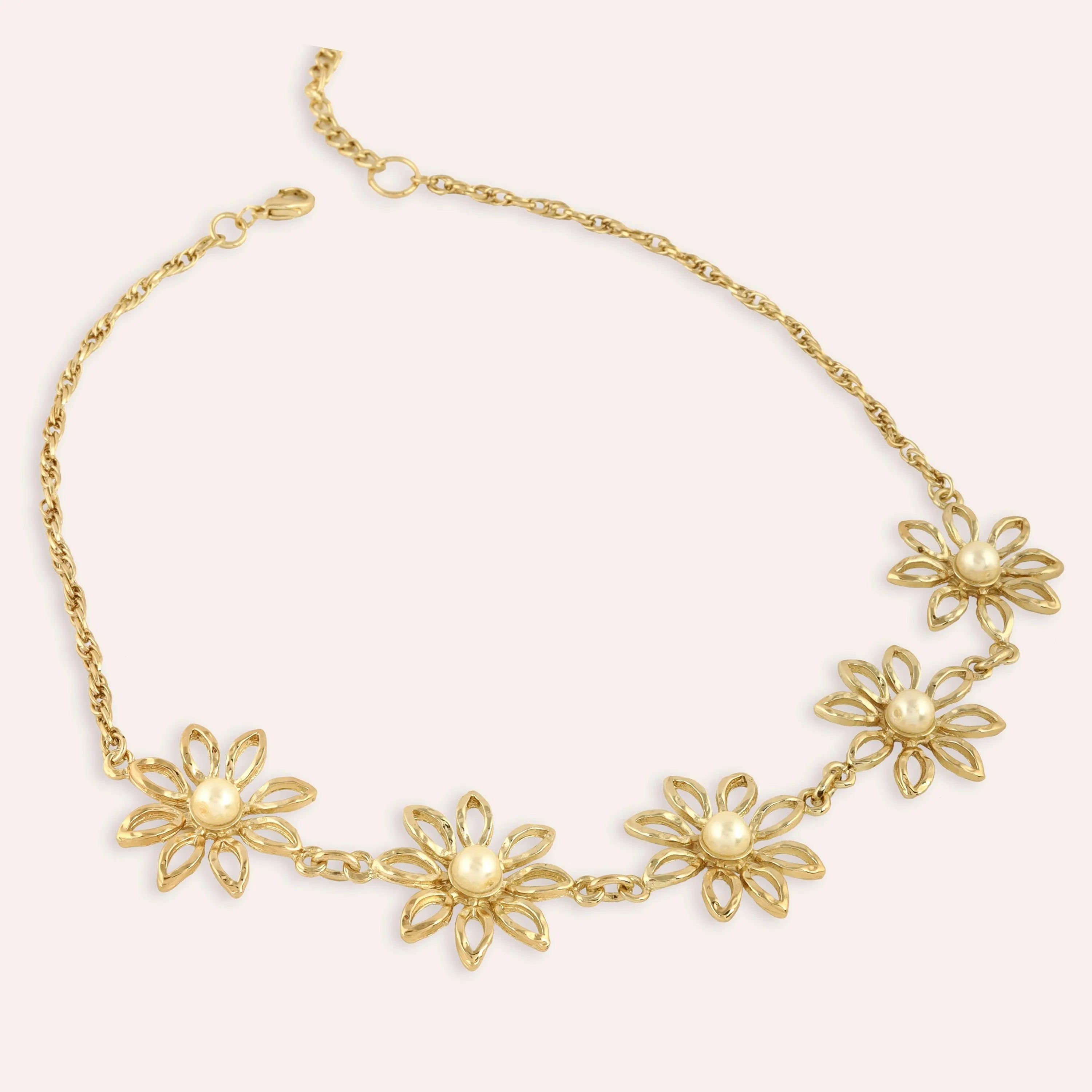 TFC Daisy Gold Plated Pearl Necklace-Enhance your elegance with our collection of gold-plated necklaces for women. Choose from stunning pendant necklaces, chic choker necklaces, and trendy layered necklaces. Our sleek and dainty designs are both affordable and anti-tarnish, ensuring lasting beauty. Enjoy the cheapest fashion jewellery, lightweight and stylish- only at The Fun Company