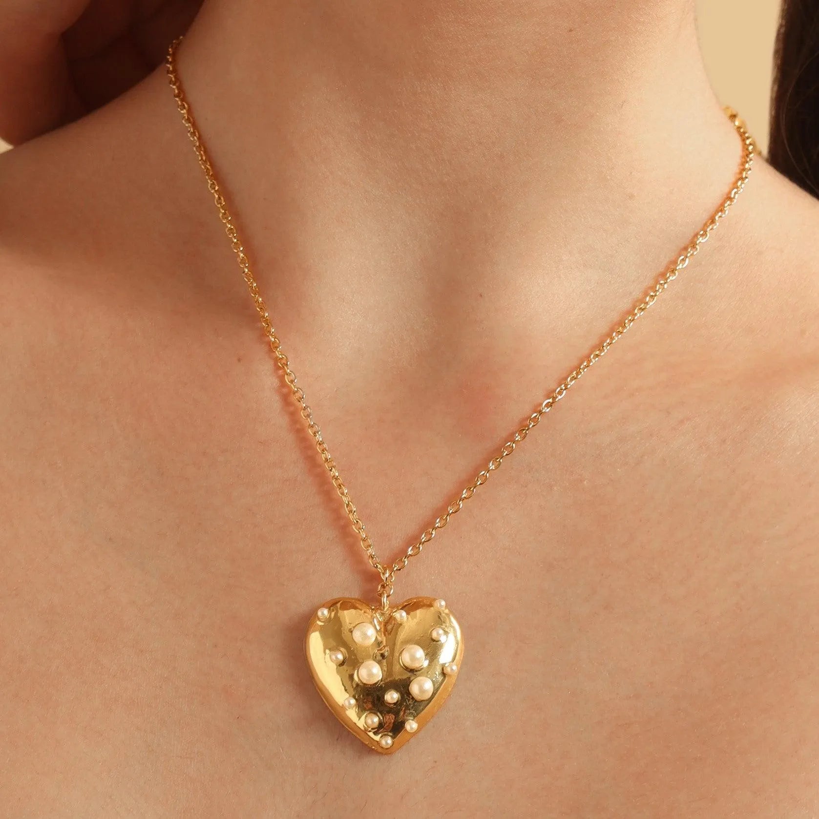 TFC Love Bump Gold Plated Pendant Necklace-Enhance your elegance with our collection of gold-plated necklaces for women. Choose from stunning pendant necklaces, chic choker necklaces, and trendy layered necklaces. Our sleek and dainty designs are both affordable and anti-tarnish, ensuring lasting beauty. Enjoy the cheapest fashion jewellery, lightweight and stylish- only at The Fun Company