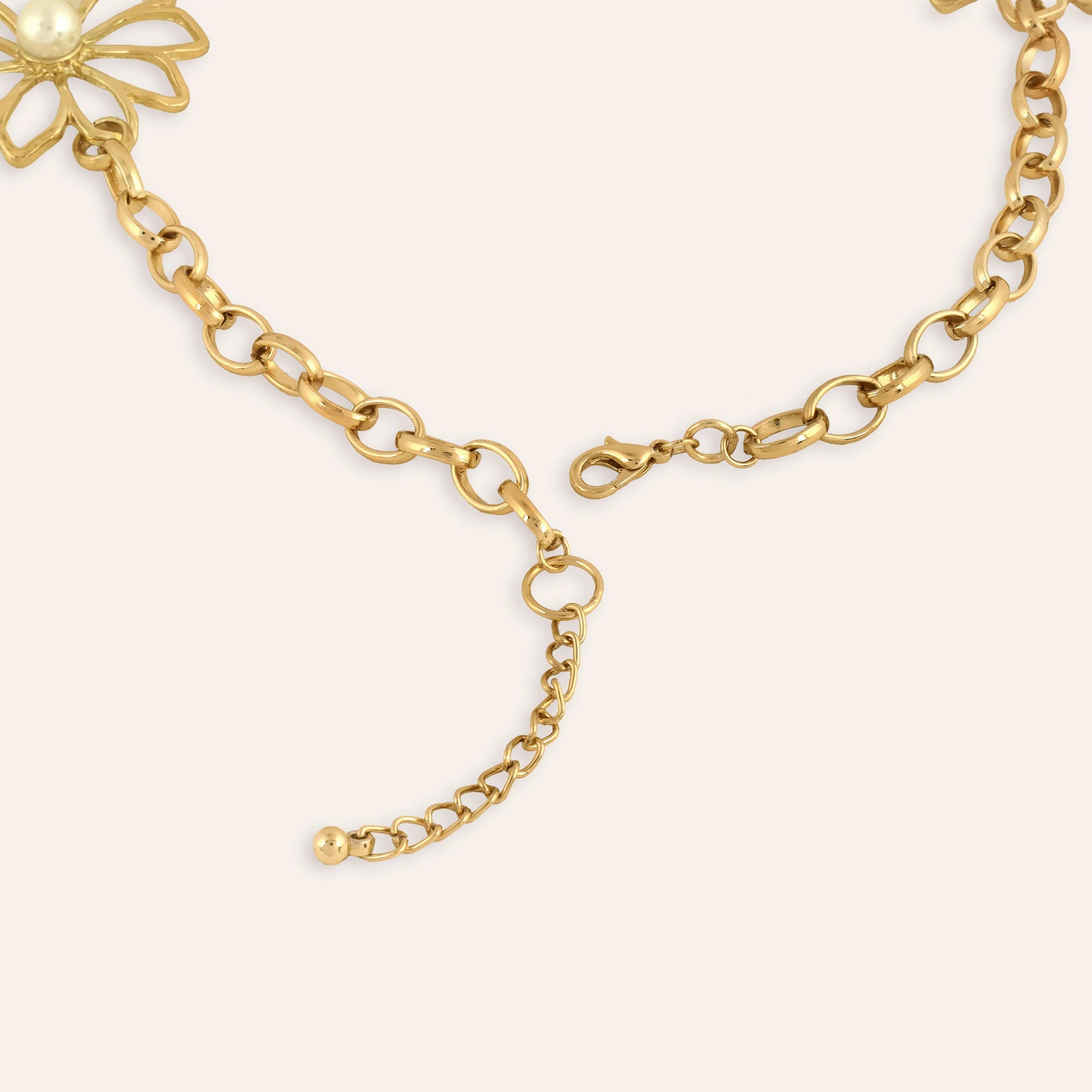 TFC Poppy Petal Gold Plated Necklace-Enhance your elegance with our collection of gold-plated necklaces for women. Choose from stunning pendant necklaces, chic choker necklaces, and trendy layered necklaces. Our sleek and dainty designs are both affordable and anti-tarnish, ensuring lasting beauty. Enjoy the cheapest fashion jewellery, lightweight and stylish- only at The Fun Company