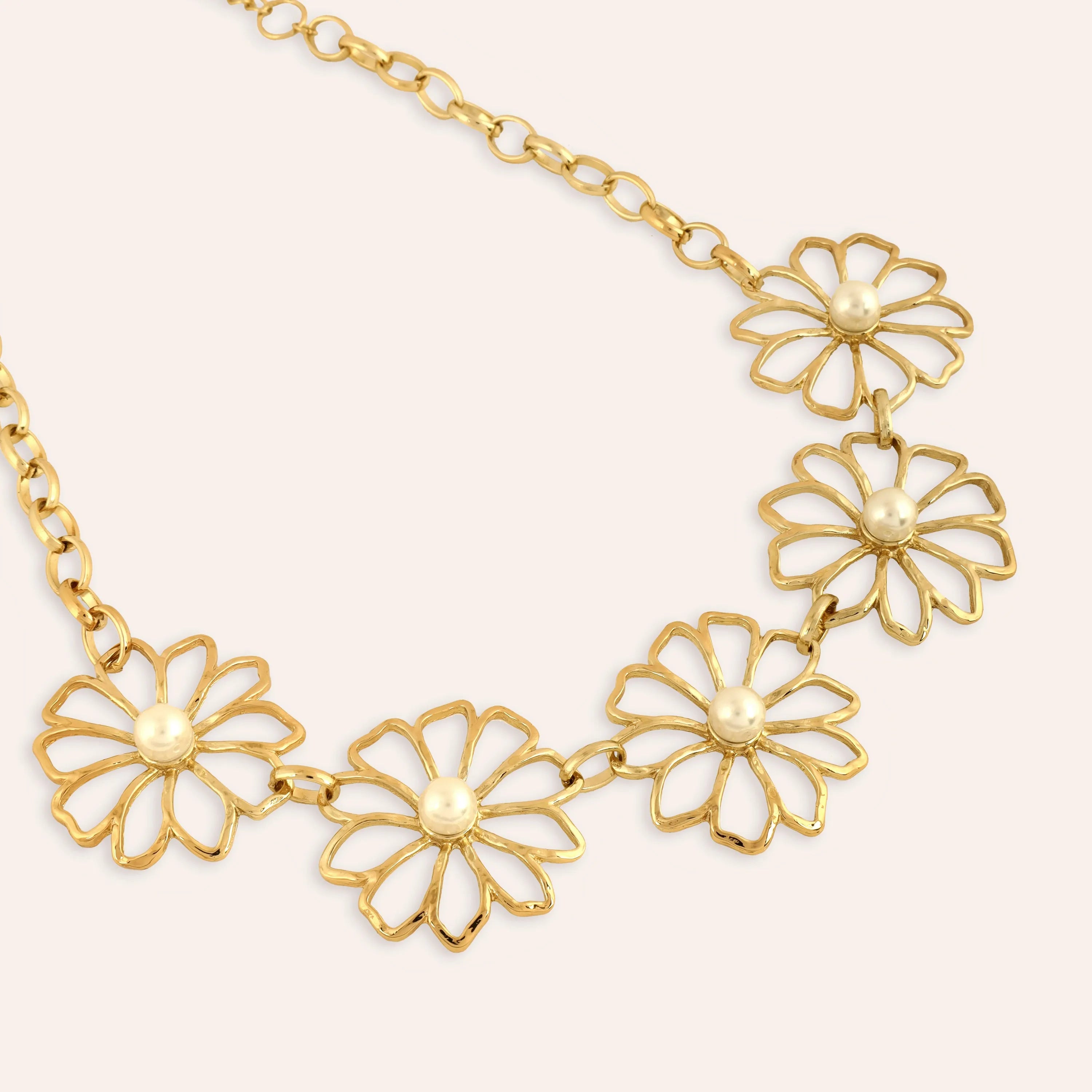 TFC Poppy Petal Gold Plated Necklace-Enhance your elegance with our collection of gold-plated necklaces for women. Choose from stunning pendant necklaces, chic choker necklaces, and trendy layered necklaces. Our sleek and dainty designs are both affordable and anti-tarnish, ensuring lasting beauty. Enjoy the cheapest fashion jewellery, lightweight and stylish- only at The Fun Company