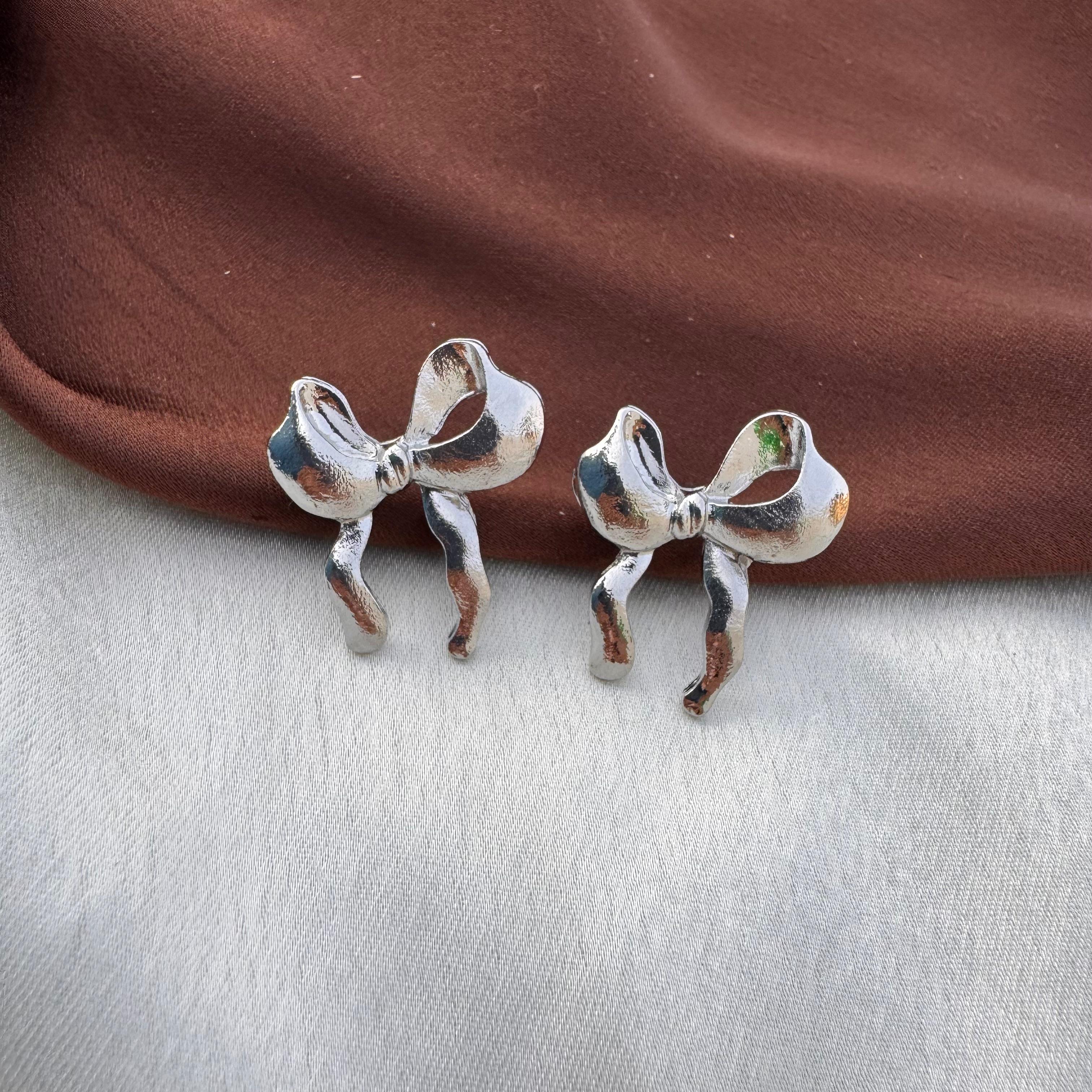TFC New Bow Silver Plated Stud Earrings
