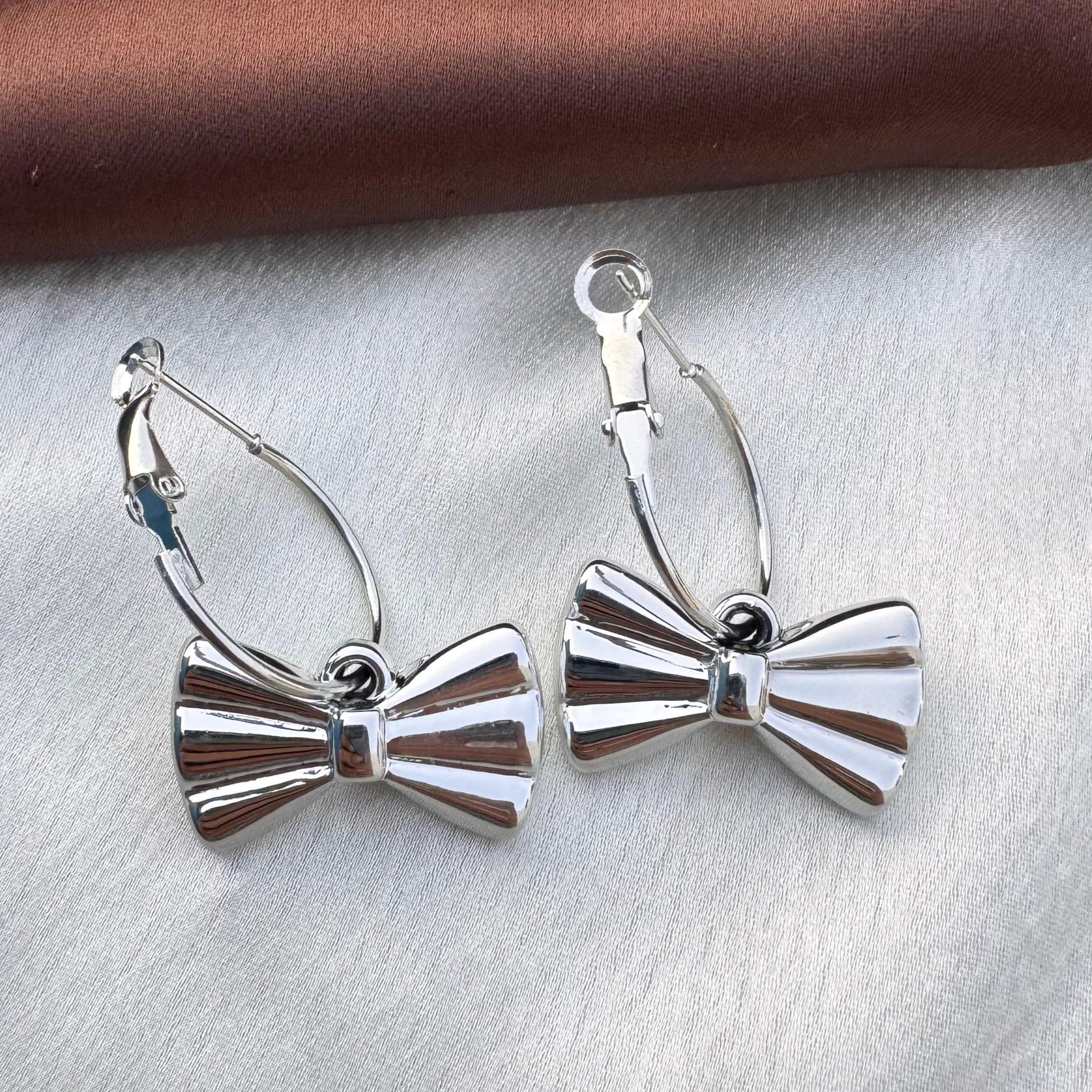 TFC Imperial Bow Silver Dangler Earrings