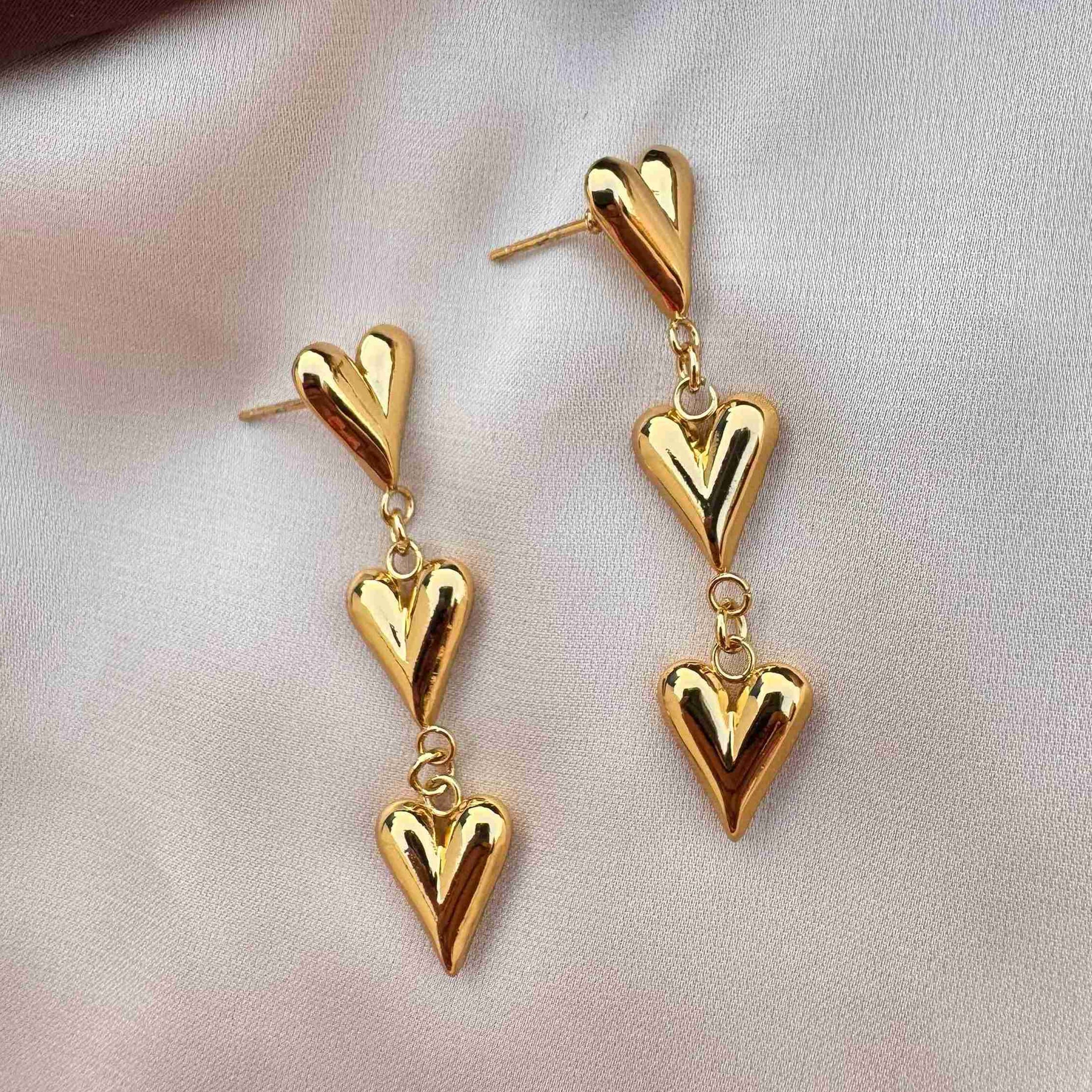 TFC Trio Of Heart Gold Plated Dangler Earrings