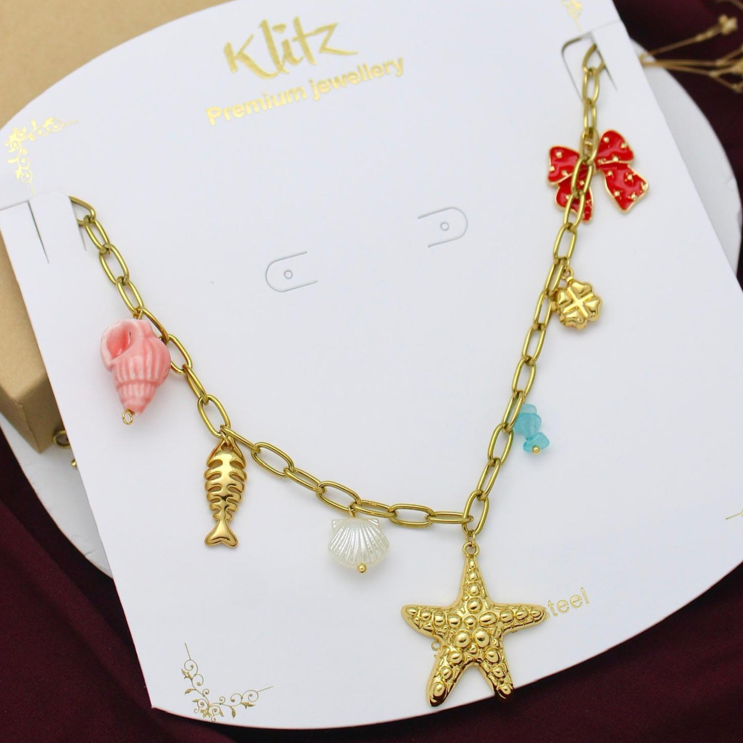 TFC Star & Bow Charms Gold Plated Necklace