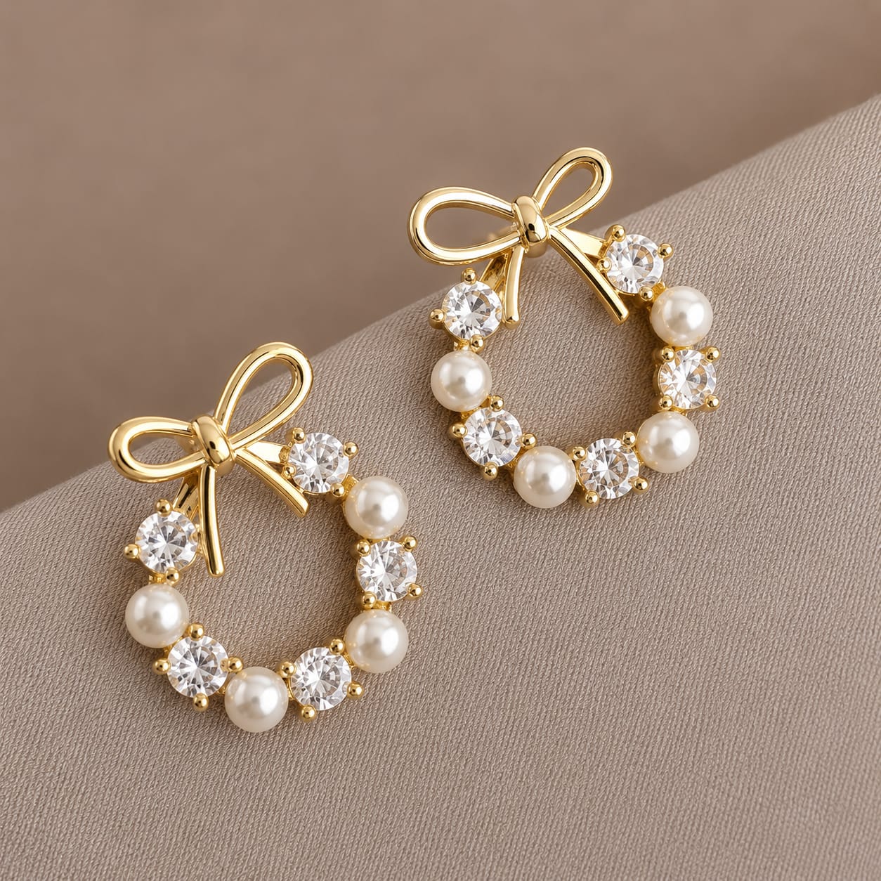 TFC Bow Circle Gold Plated Stud Earrings