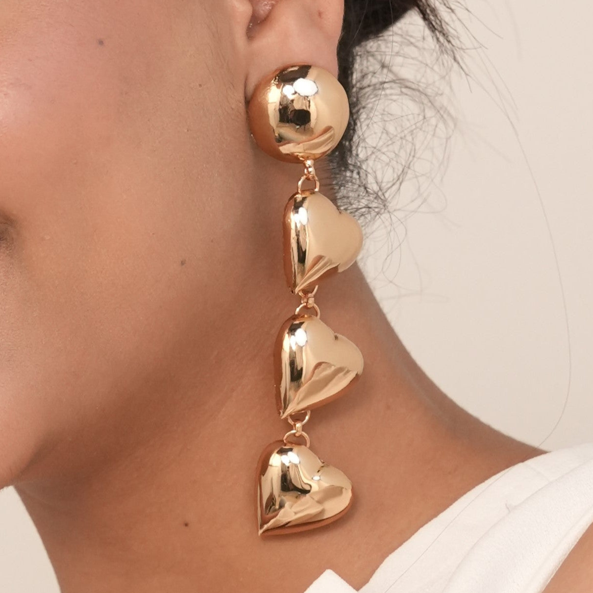 TFC Bold Heart Sway Gold Plated Dangler Earrings