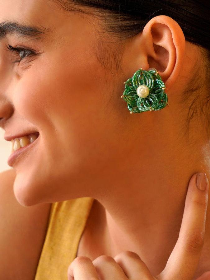 Statement Earrings: Highlight the art of styling statement earrings