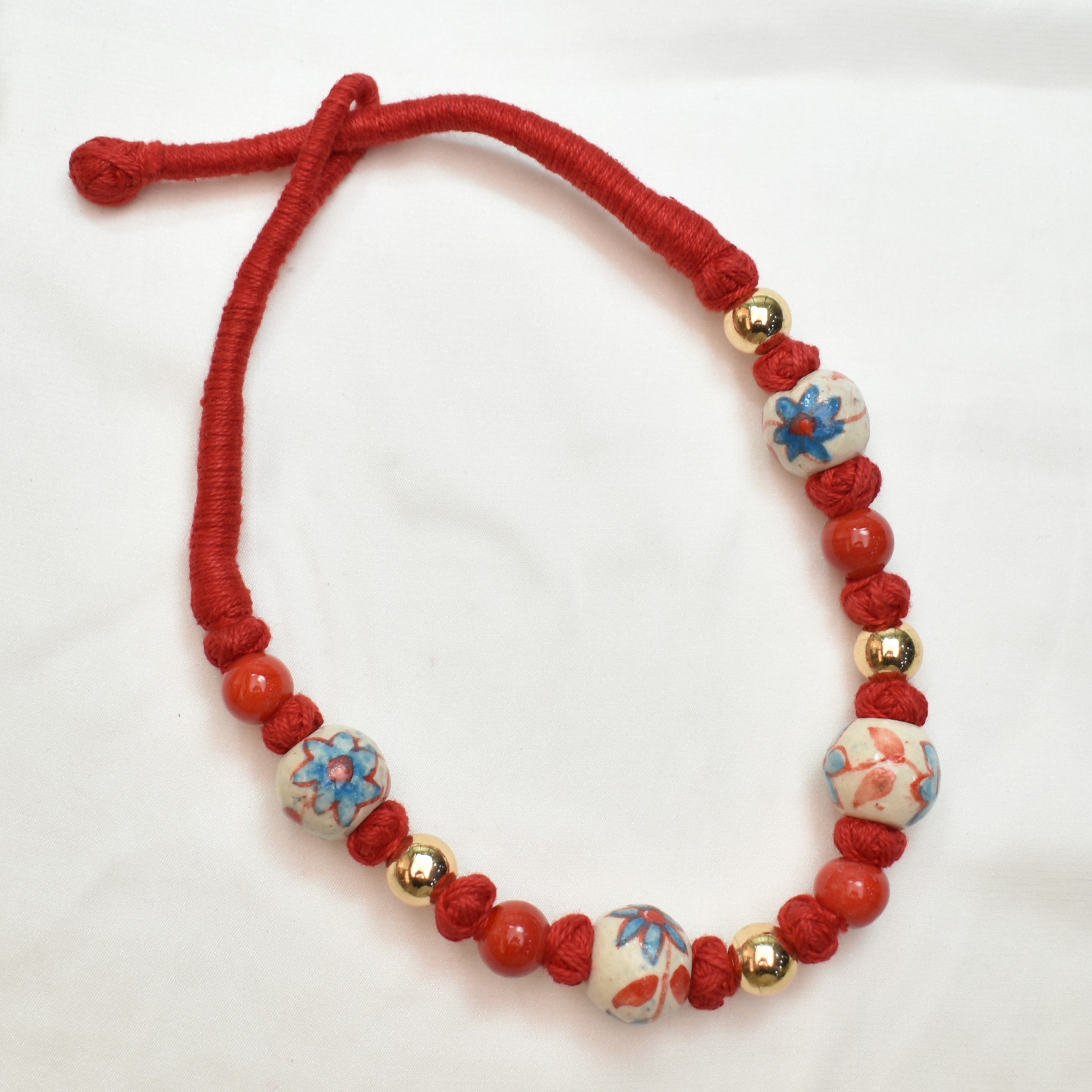 TFC Patwa Art Necklace With Red Thread And Mix Beads