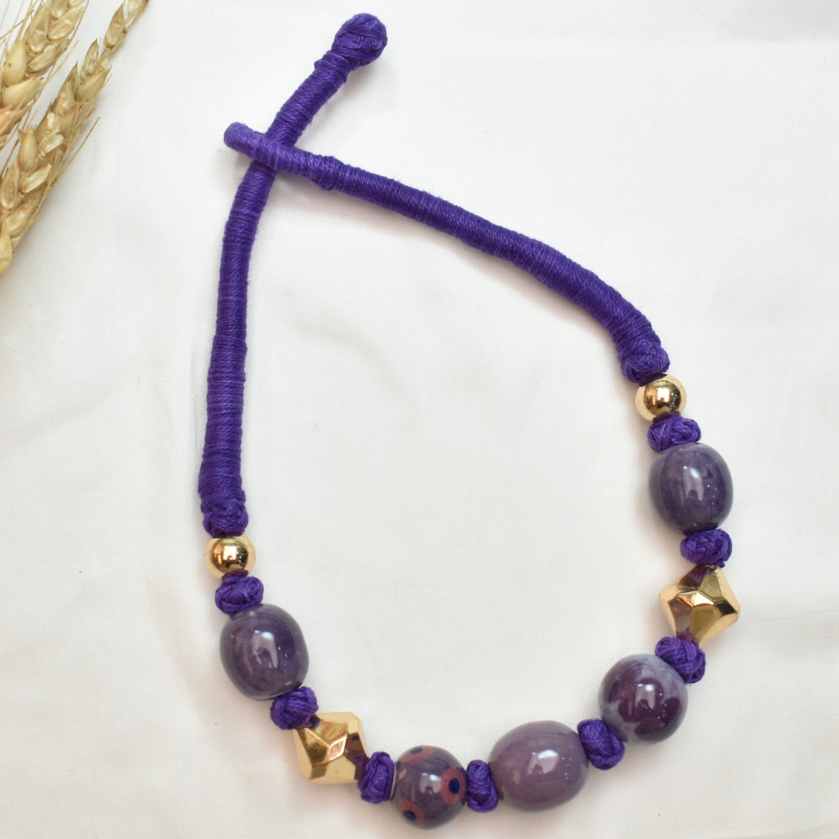 TFC Patwa Art Necklace With Purple Thread And Mix Beads