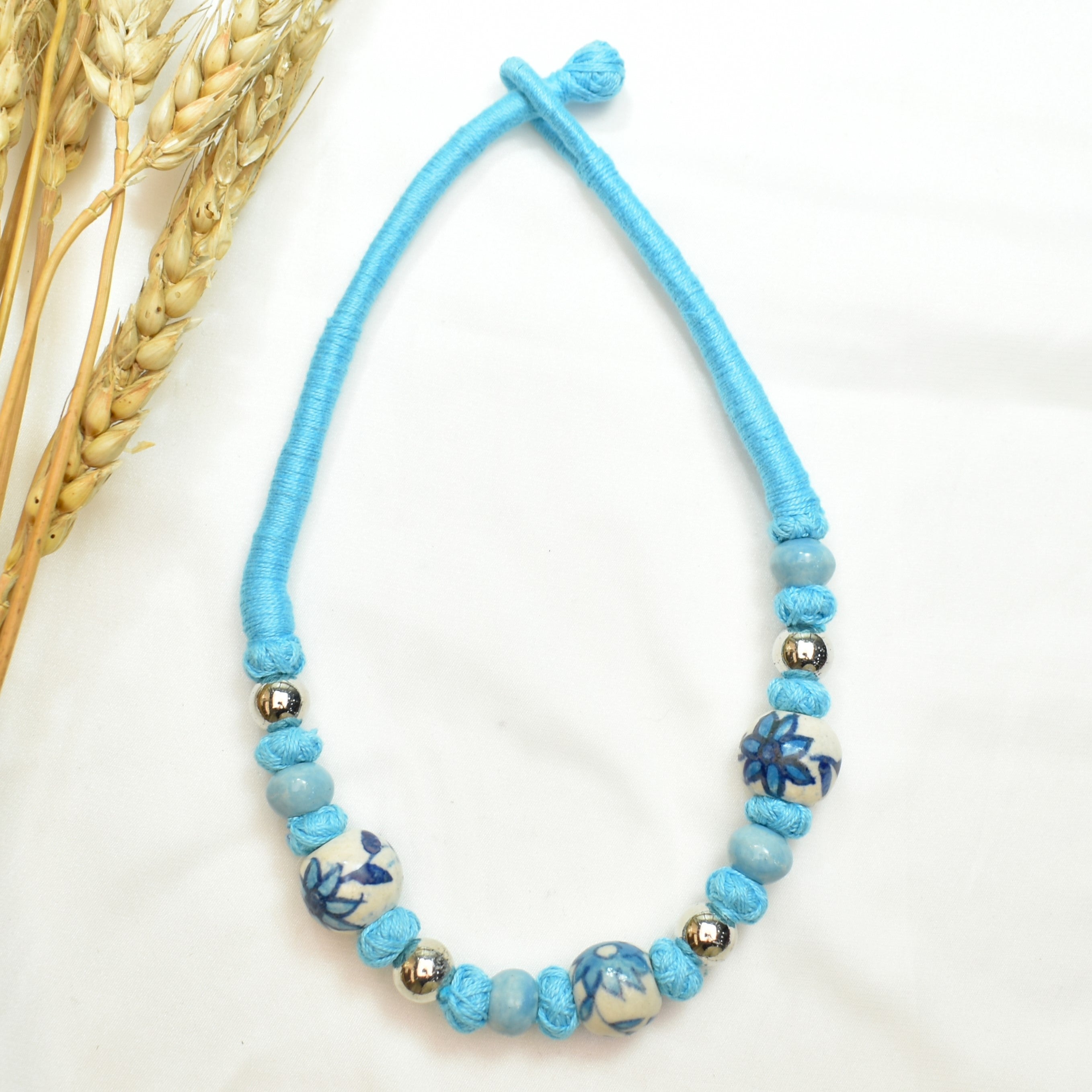 TFC Patwa Art Necklace With Sky Blue Thread And Mix Beads