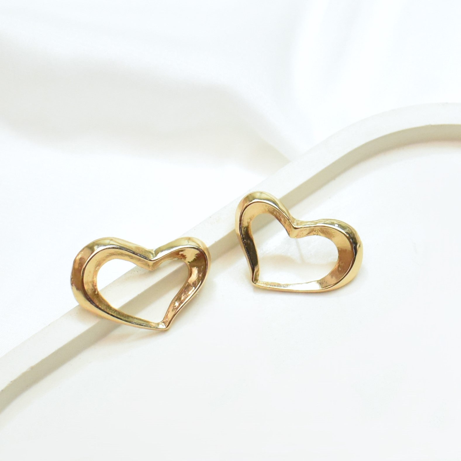 TFC Heart Move Gold Plated Stud Earrings