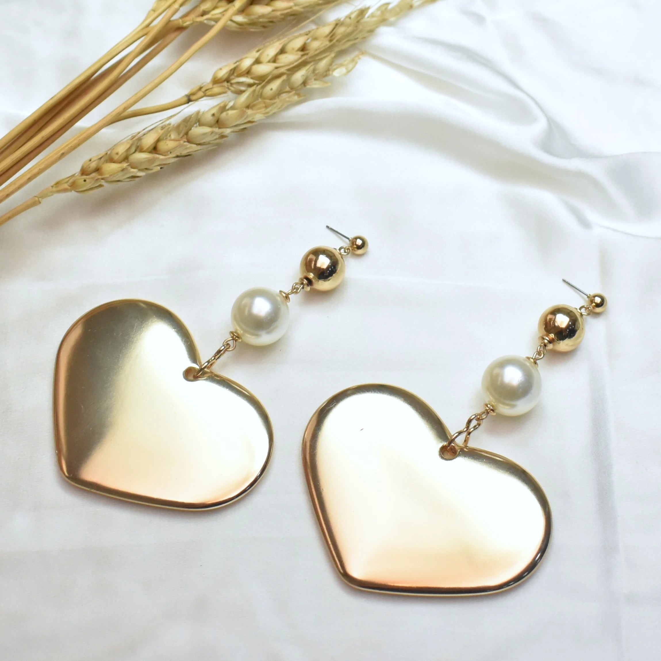 TFC Heart Of Luxury Gold Plated Dangler Earrings