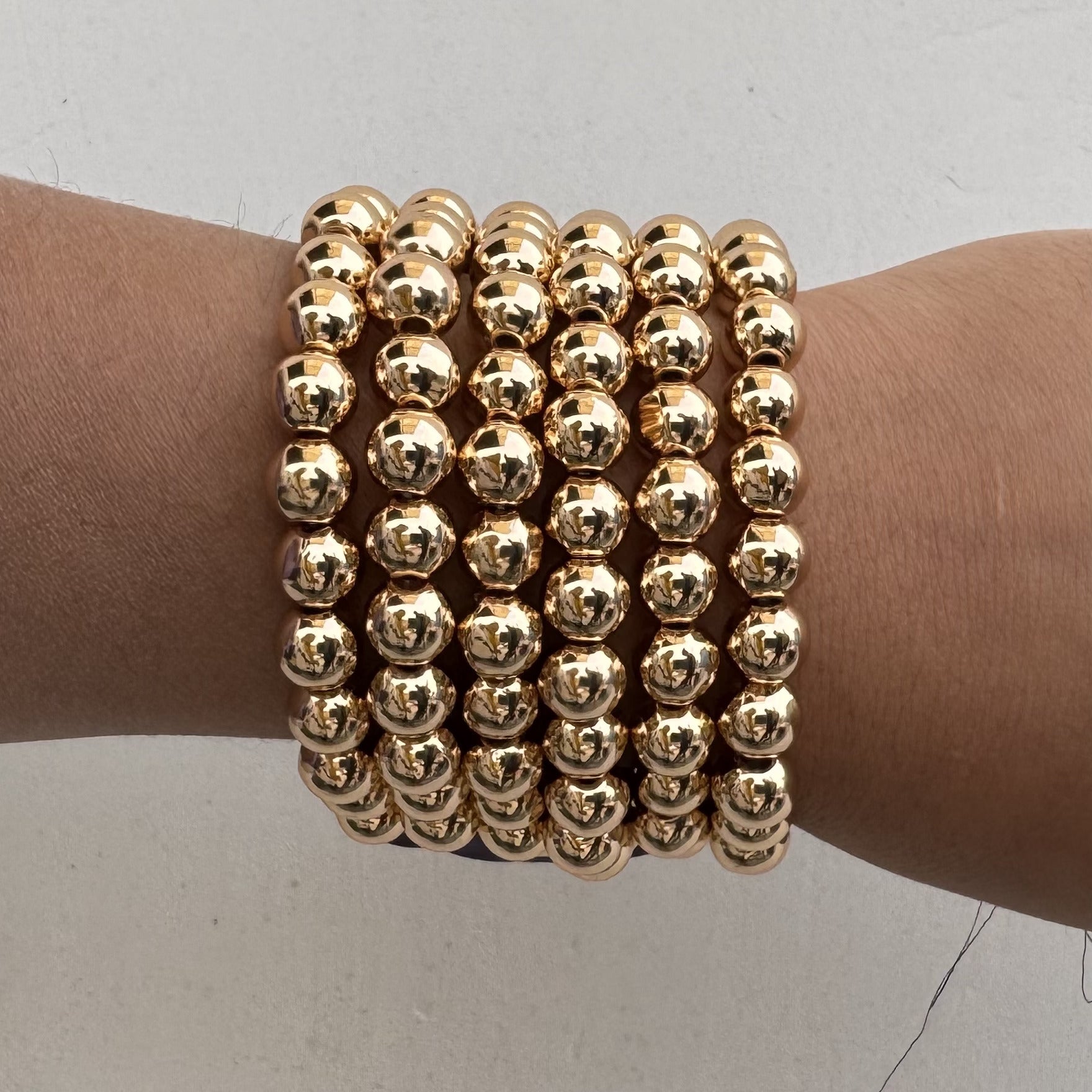 TFC Round Bead Gold Plated Stacked Bracelet ( Set Of 6)