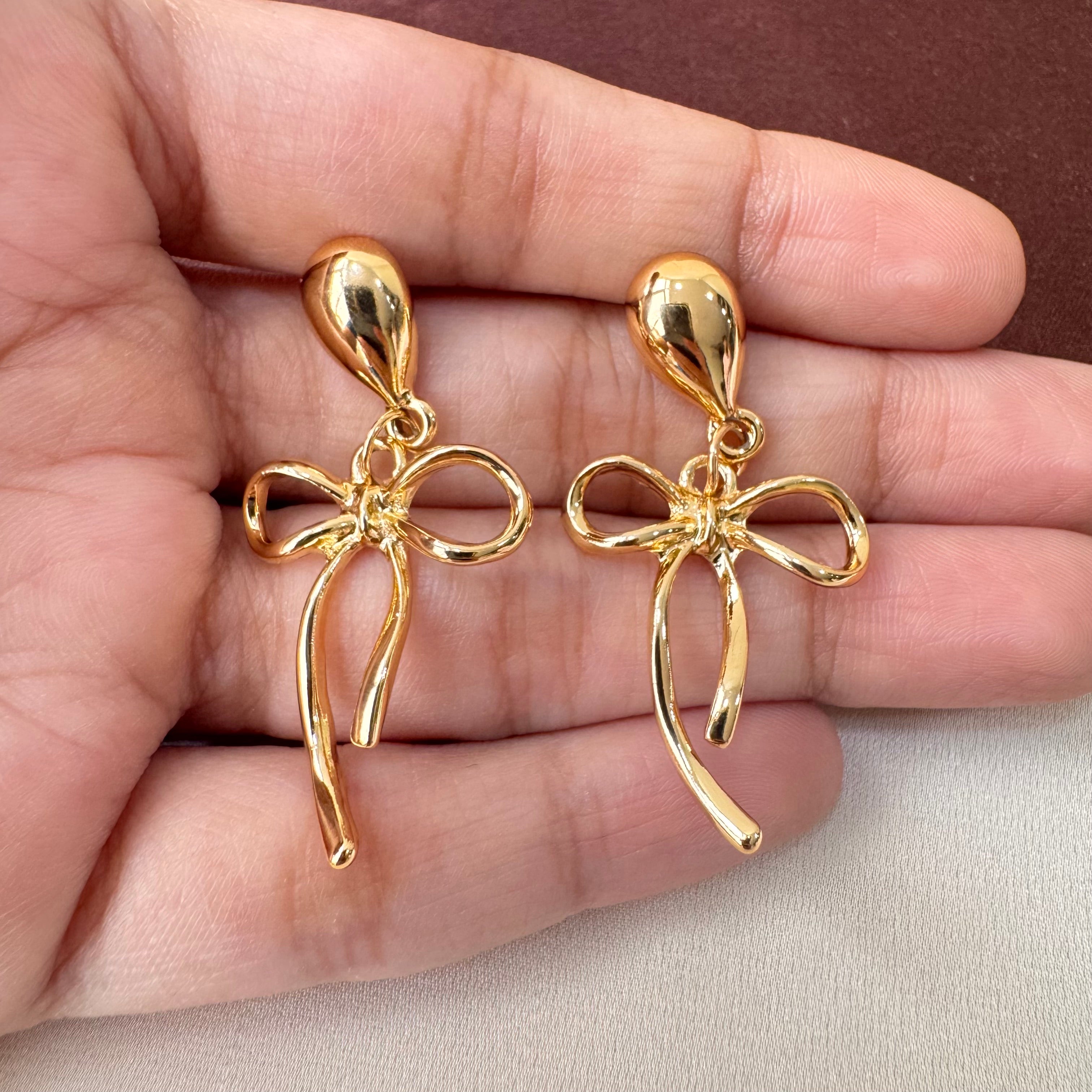 TFC Bow Drop Gold Plated Dangler Earrings