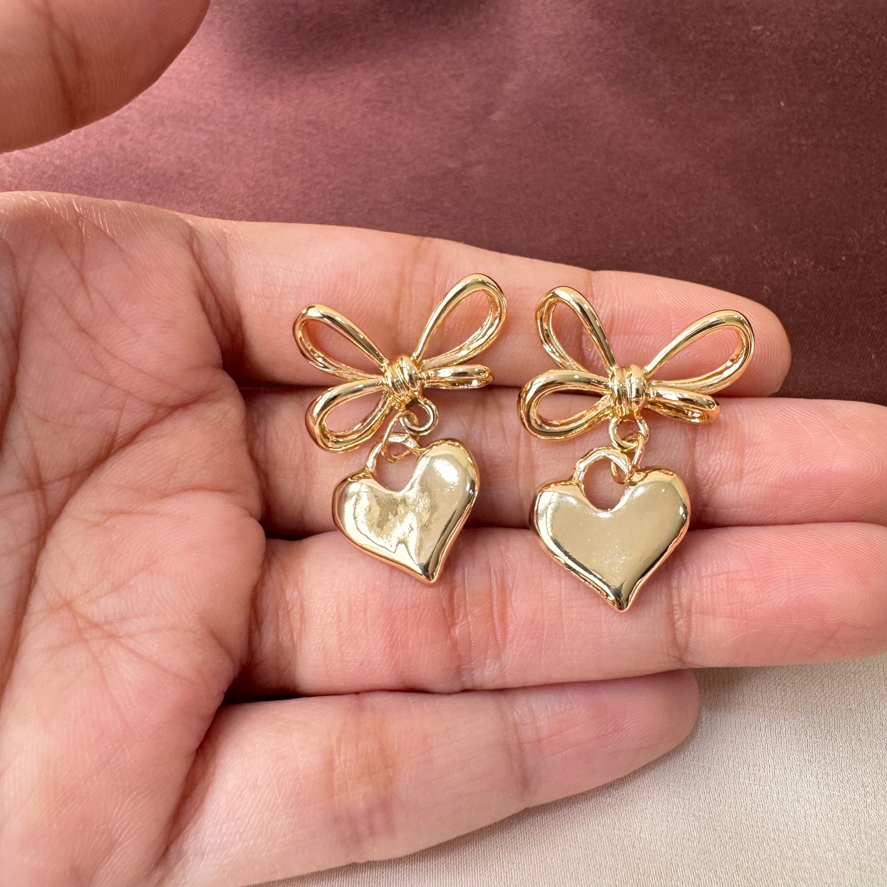 TFC Bow & Hanging Heart Gold Plated Dangler Earrings