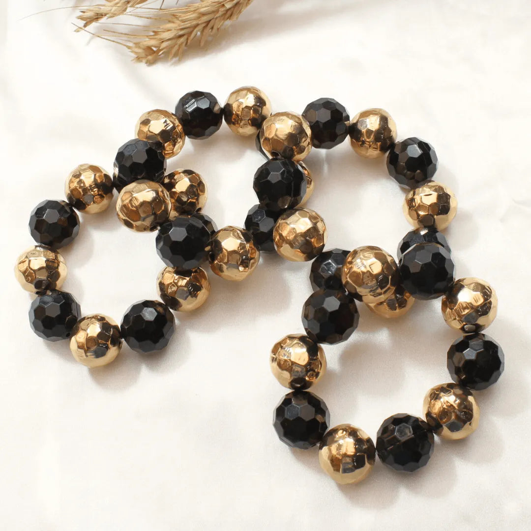 TFC Black And Gold Bold Bead Gold Plated Stacked Bracelet (Set of 4)