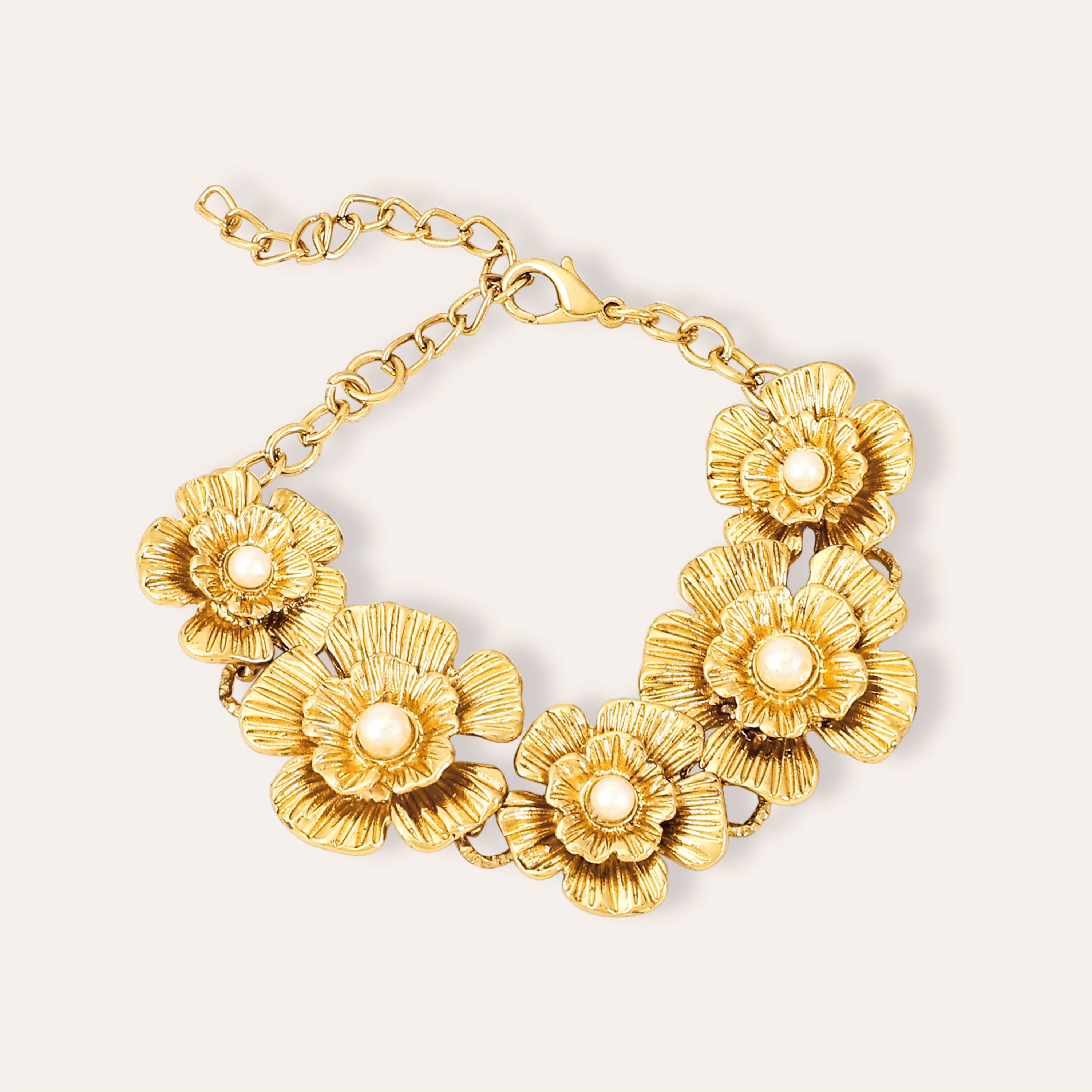 TFC Bloom Essence Gold Plated bracelet-Discover our stunning collection of stylish bracelets for women, featuring exquisite pearl bracelets, handcrafted beaded bracelets, and elegant gold-plated designs. Enjoy cheapest anti-tarnish fashion jewellery and long-lasting brilliance only at The Fun Company