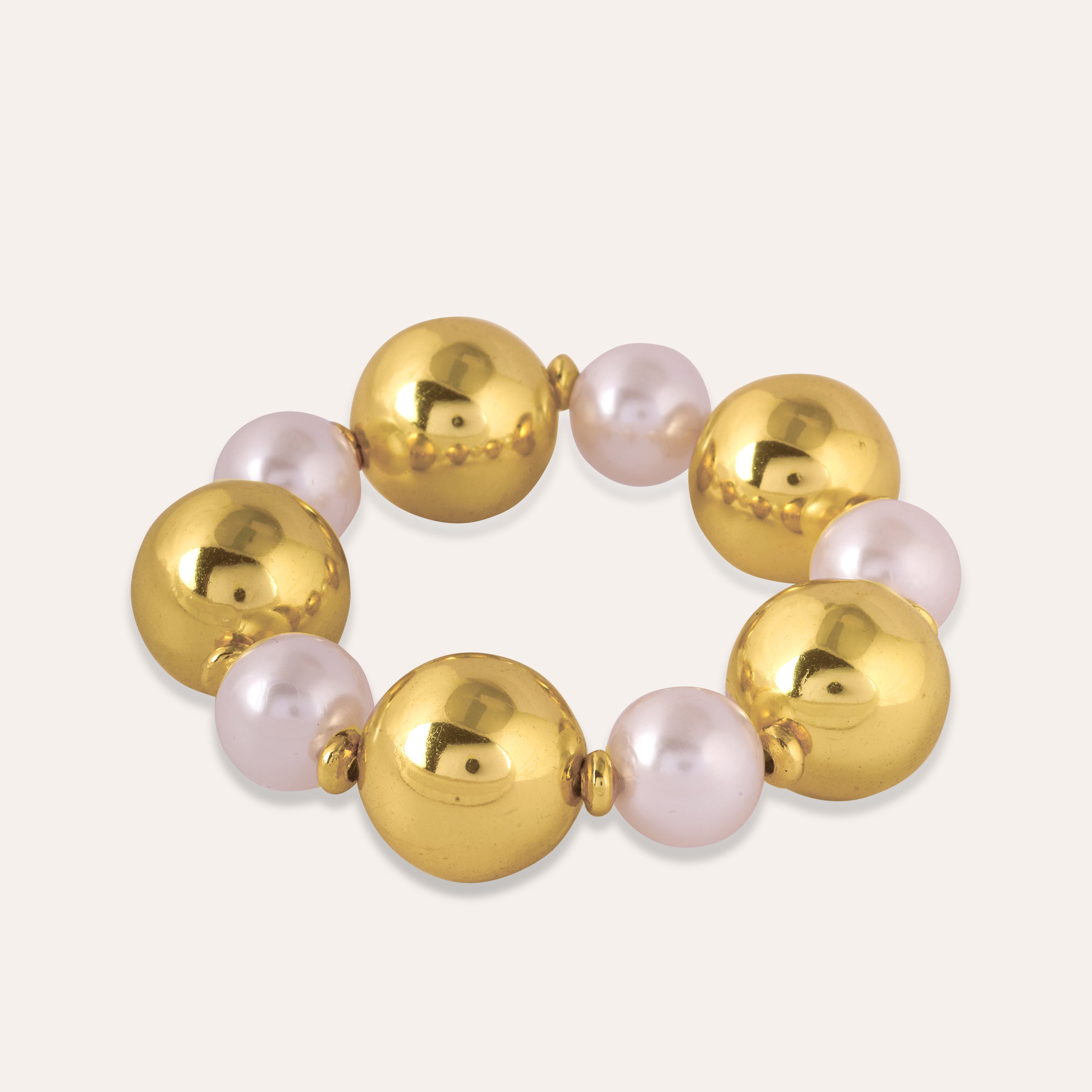 TFC Bold And Gold Pearl Bead Bracelet-Discover our stunning collection of stylish bracelets for women, featuring exquisite pearl bracelets, handcrafted beaded bracelets, and elegant gold-plated designs. Enjoy cheapest anti-tarnish fashion jewellery and long-lasting brilliance onl