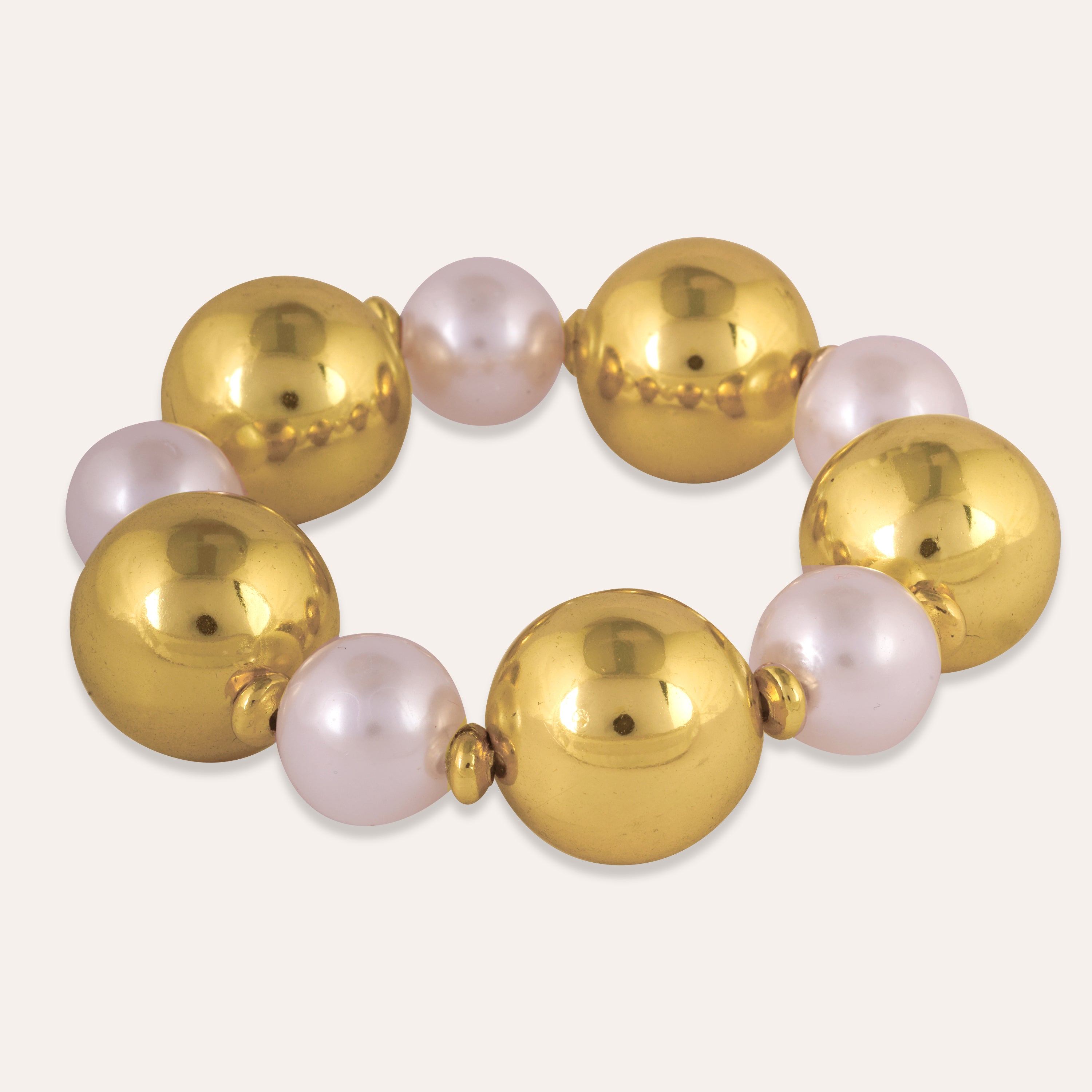 TFC Bold And Gold Pearl Bead Bracelet-Discover our stunning collection of stylish bracelets for women, featuring exquisite pearl bracelets, handcrafted beaded bracelets, and elegant gold-plated designs. Enjoy cheapest anti-tarnish fashion jewellery and long-lasting brilliance onl