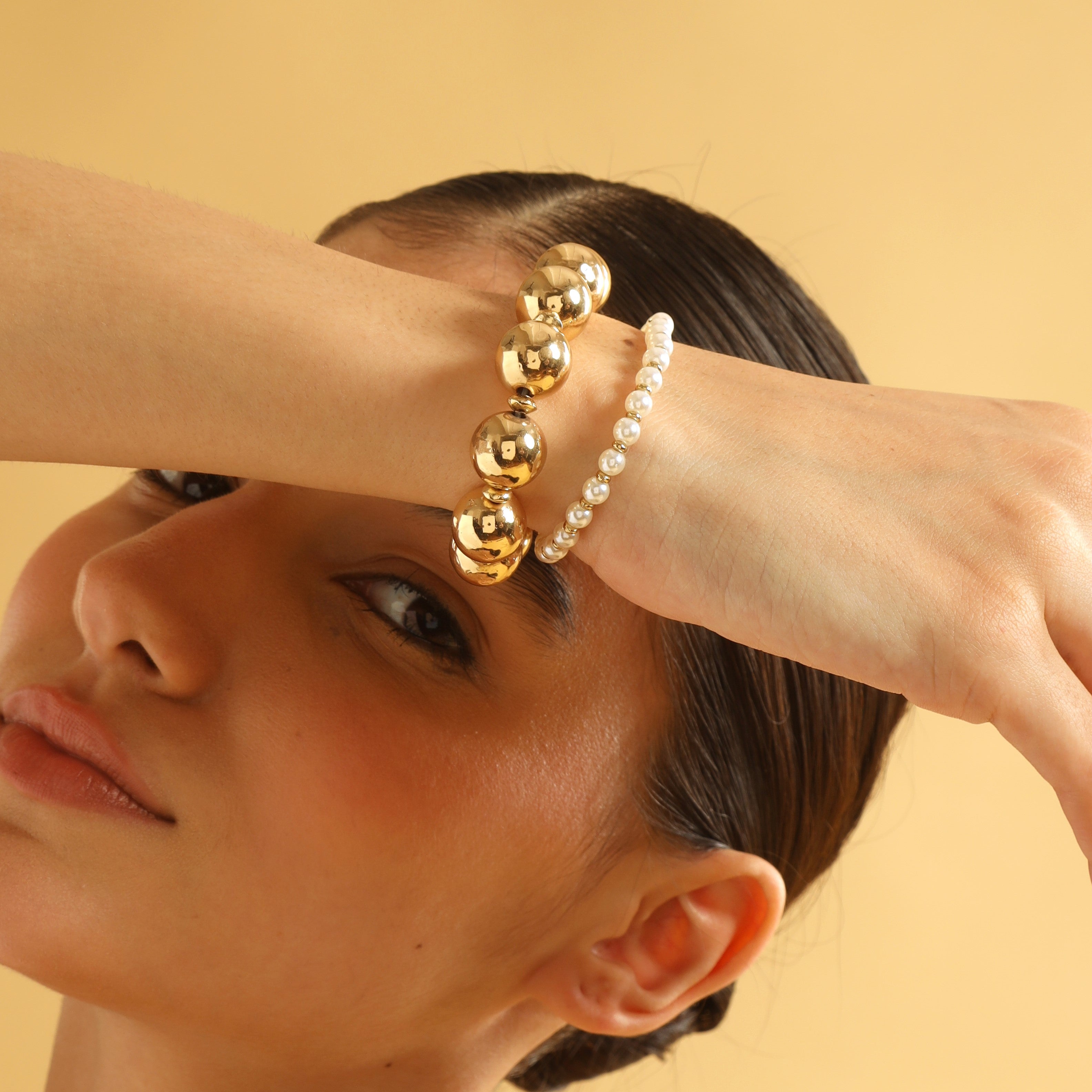 TFC Pretty Pearl and Gold Stack Bracelet-Discover our stunning collection of stylish bracelets for women, featuring exquisite pearl bracelets, handcrafted beaded bracelets, and elegant gold-plated designs. Enjoy cheapest anti-tarnish fashion jewellery and long-lasting brilliance only at The Fun Company