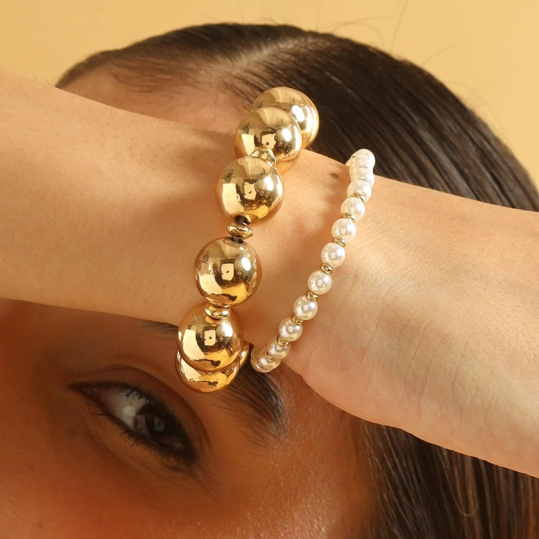 TFC Pretty Pearl and Gold Stack Bracelet-Discover our stunning collection of stylish bracelets for women, featuring exquisite pearl bracelets, handcrafted beaded bracelets, and elegant gold-plated designs. Enjoy cheapest anti-tarnish fashion jewellery and long-lasting brilliance only at The Fun Company