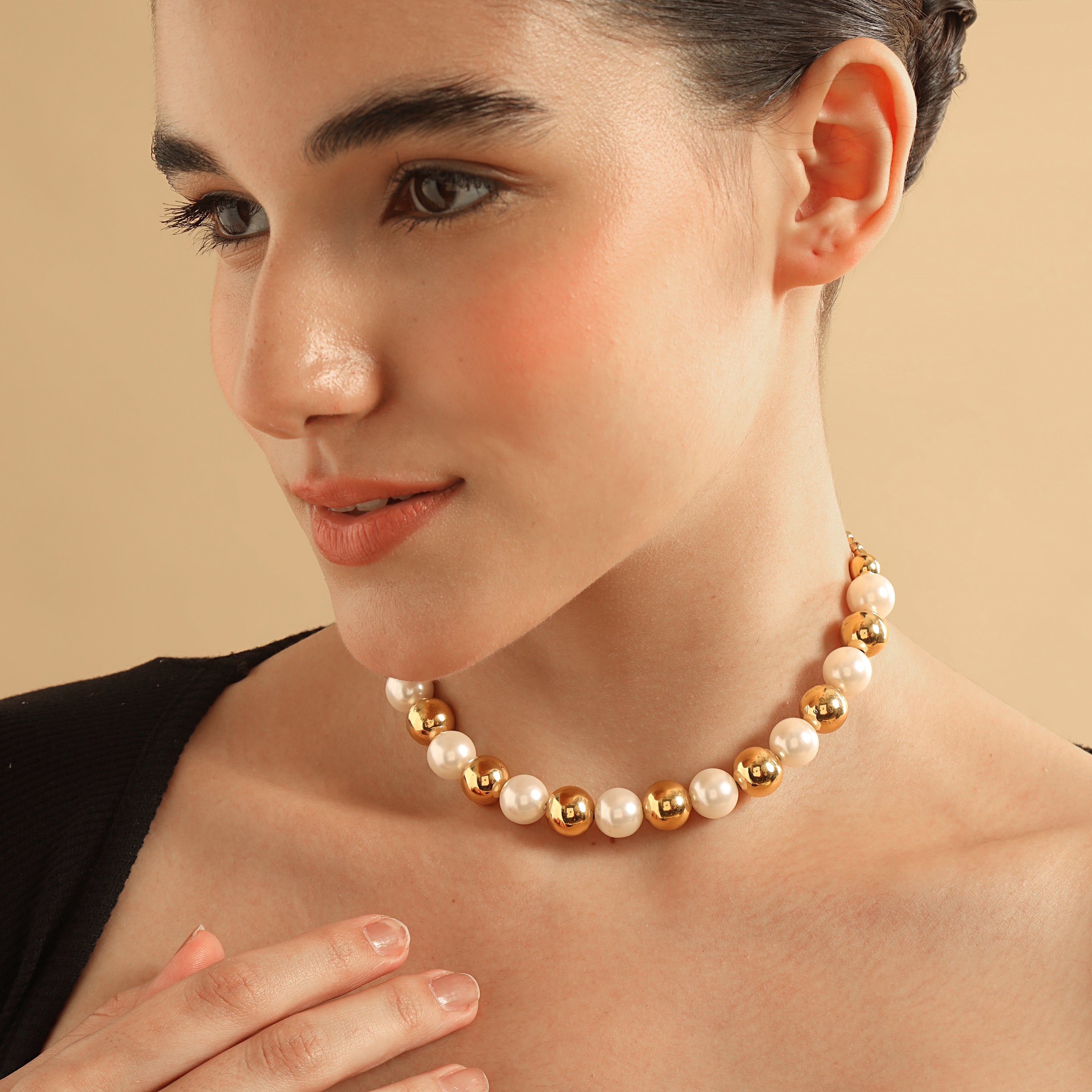 TFC Pearl and Gold Bead Choker Necklace-Enhance your elegance with our collection of gold-plated necklaces for women. Choose from stunning pendant necklaces, chic choker necklaces, and trendy layered necklaces. Our sleek and dainty designs are both affordable and anti-tarnish, ensuring lasting beauty. Enjoy the cheapest fashion jewellery, lightweight and stylish- only at The Fun Company.