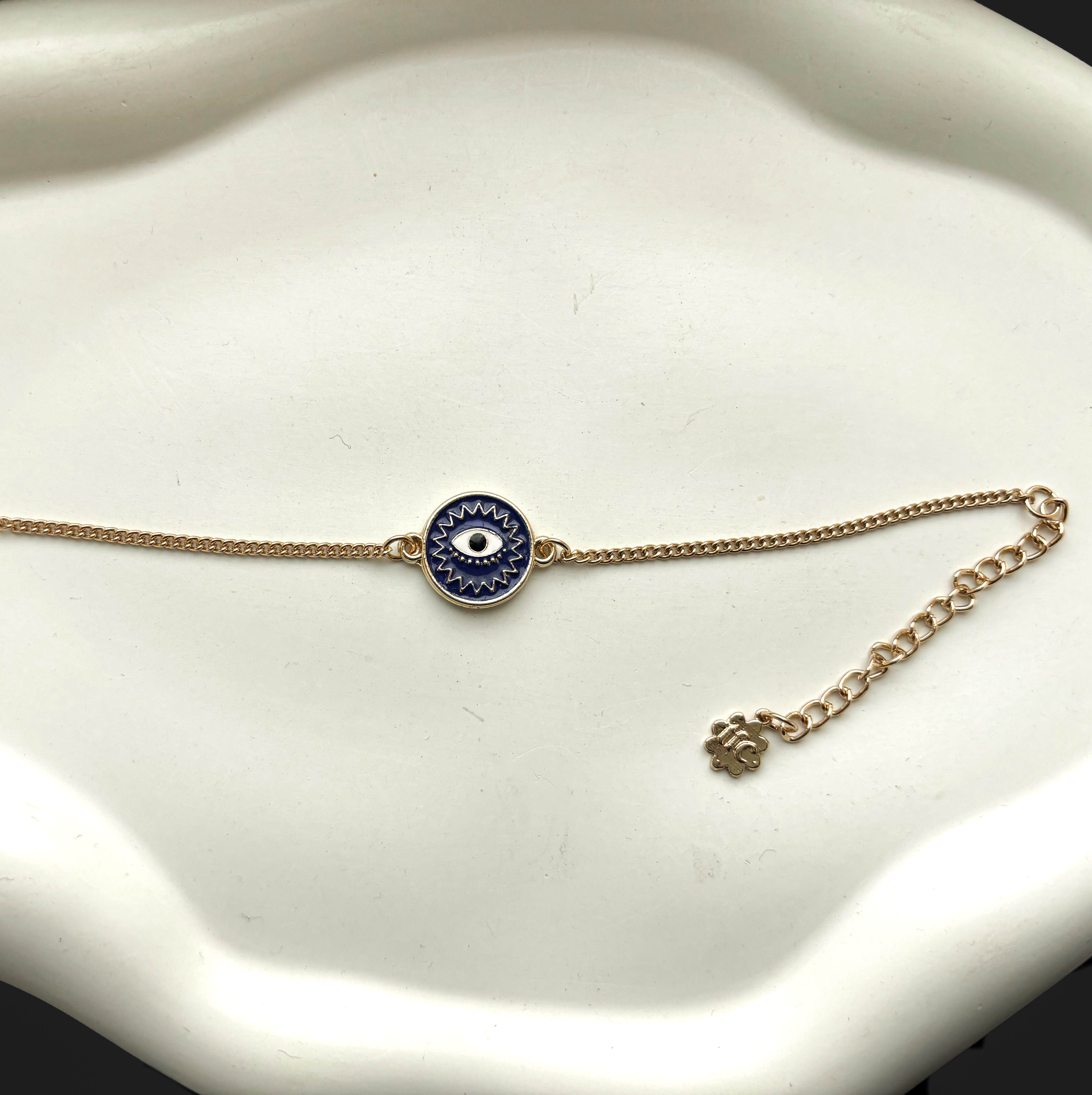 TFC Circle Evil Eye Gold Plated Bracelet-Discover our stunning collection of stylish bracelets for women, featuring exquisite pearl bracelets, handcrafted beaded bracelets, and elegant gold-plated designs. Enjoy cheapest anti-tarnish fashion jewellery and long-lasting brilliance only at The Fun Company.