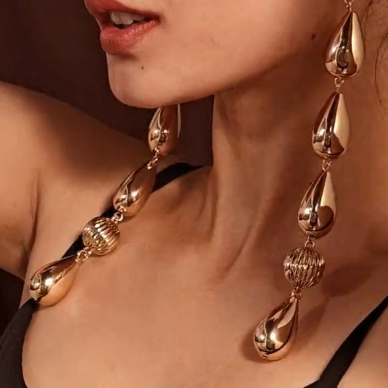 TFC Deepika Drop Bead Vortex Gold Plated Shoulder Duster Dangler Earrings