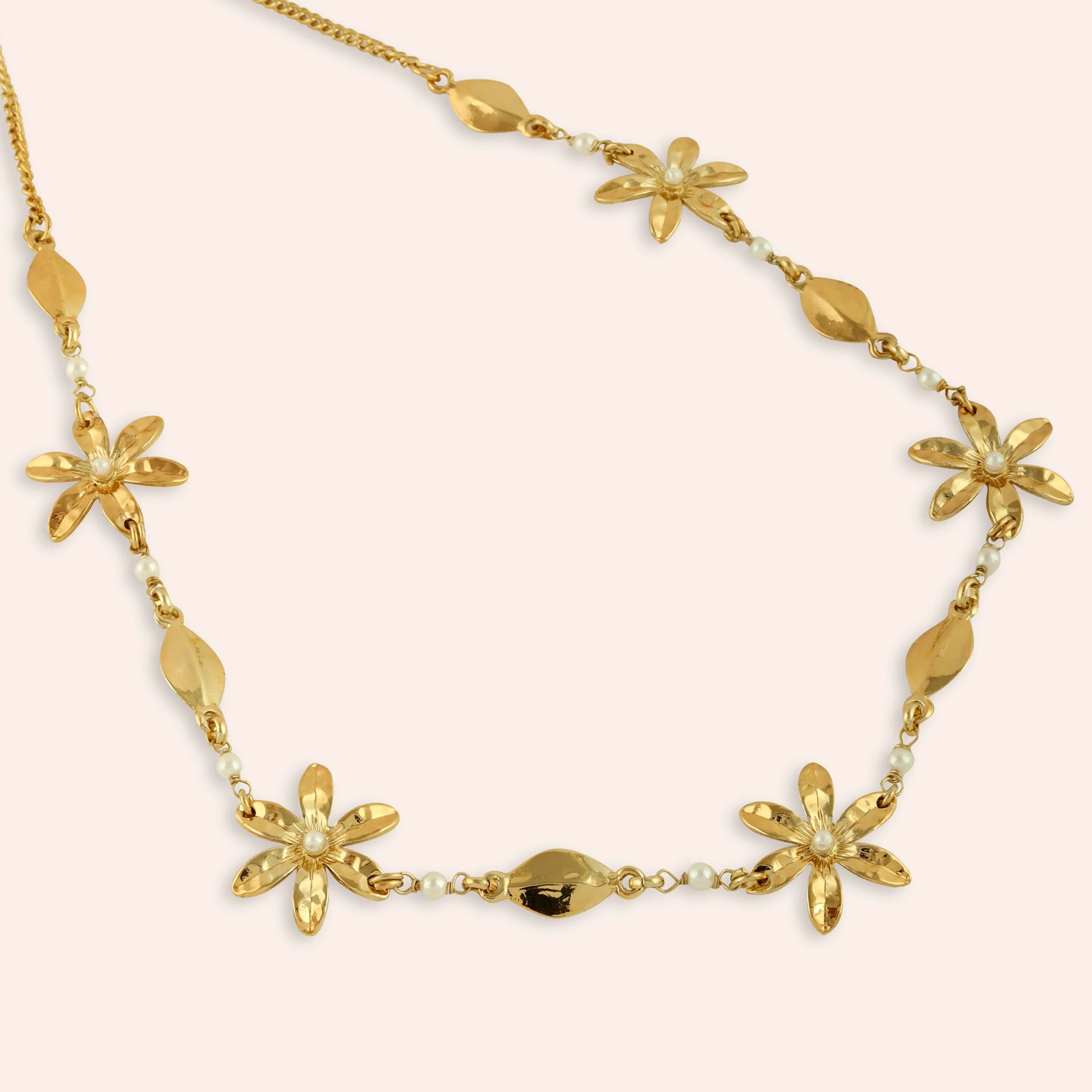 TFC Floral Gold Plated Pearl Necklace-Enhance your elegance with our collection of gold-plated necklaces for women. Choose from stunning pendant necklaces, chic choker necklaces, and trendy layered necklaces. Our sleek and dainty designs are both affordable and anti-tarnish, ensuring lasting beauty. Enjoy the cheapest fashion jewellery, lightweight and stylish- only at The Fun Company