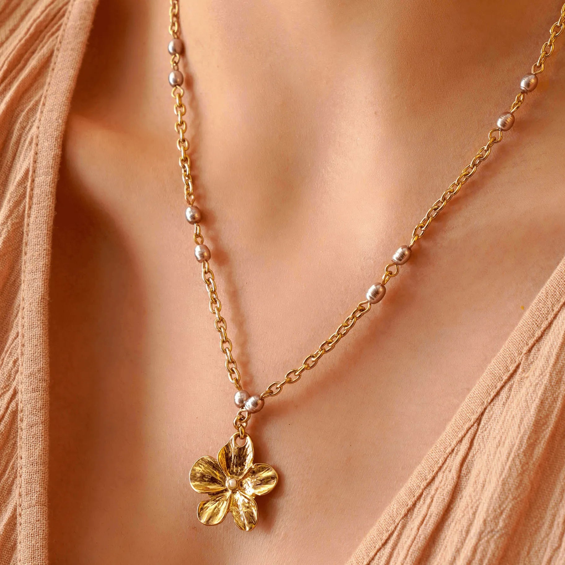 TFC Golden Flower Gold Plated Pendant Necklace-Enhance your elegance with our collection of gold-plated necklaces for women. Choose from stunning pendant necklaces, chic choker necklaces, and trendy layered necklaces. Our sleek and dainty designs are both affordable and anti-tarnish, ensuring lasting beauty. Enjoy the cheapest fashion jewellery, lightweight and stylish- only at The Fun Company