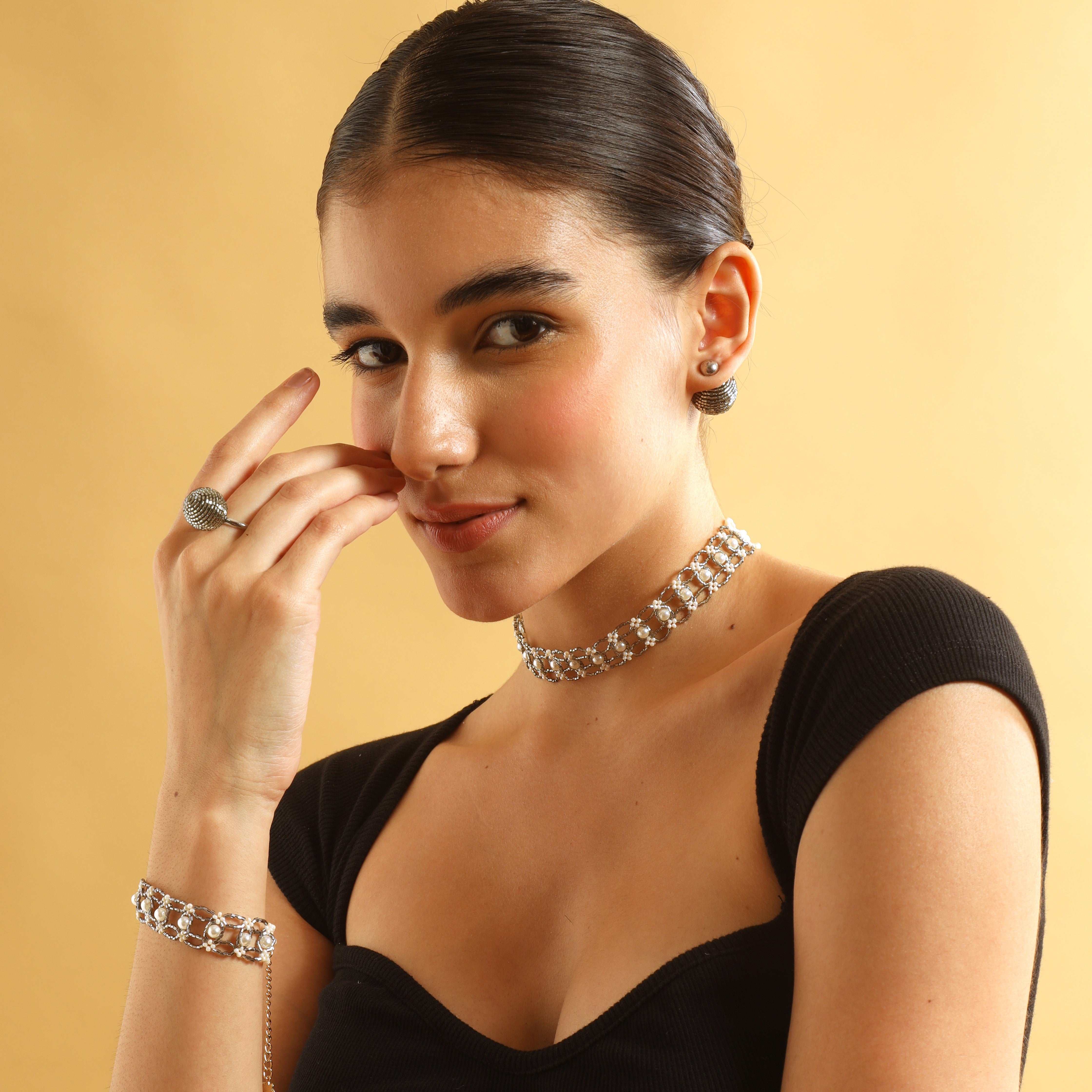 TFC Silver Cutdana and Pearl Choker Necklace-Enhance your elegance with our collection of gold-plated necklaces for women. Choose from stunning pendant necklaces, chic choker necklaces, and trendy layered necklaces. Our sleek and dainty designs are both affordable and anti-tarnish, ensuring lasting beauty. Enjoy the cheapest fashion jewellery, lightweight and stylish- only at The Fun Company.