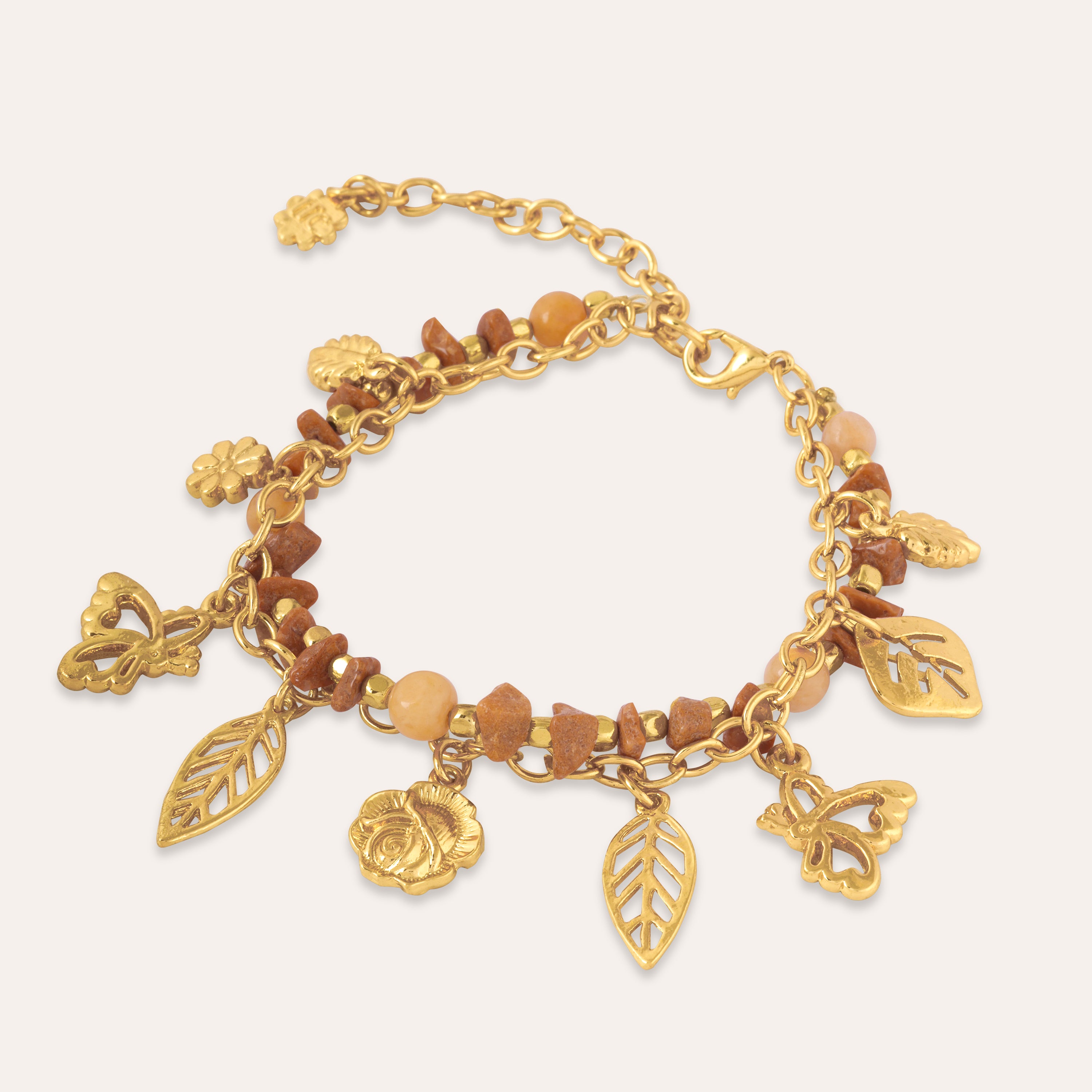 TFC Stones and Charms Gold Plated Bracelet Stack-Discover our stunning collection of stylish bracelets for women, featuring exquisite pearl bracelets, handcrafted beaded bracelets, and elegant gold-plated designs. Enjoy cheapest anti-tarnish fashion jewellery and long-lasting brilliance only at The Fun Company.