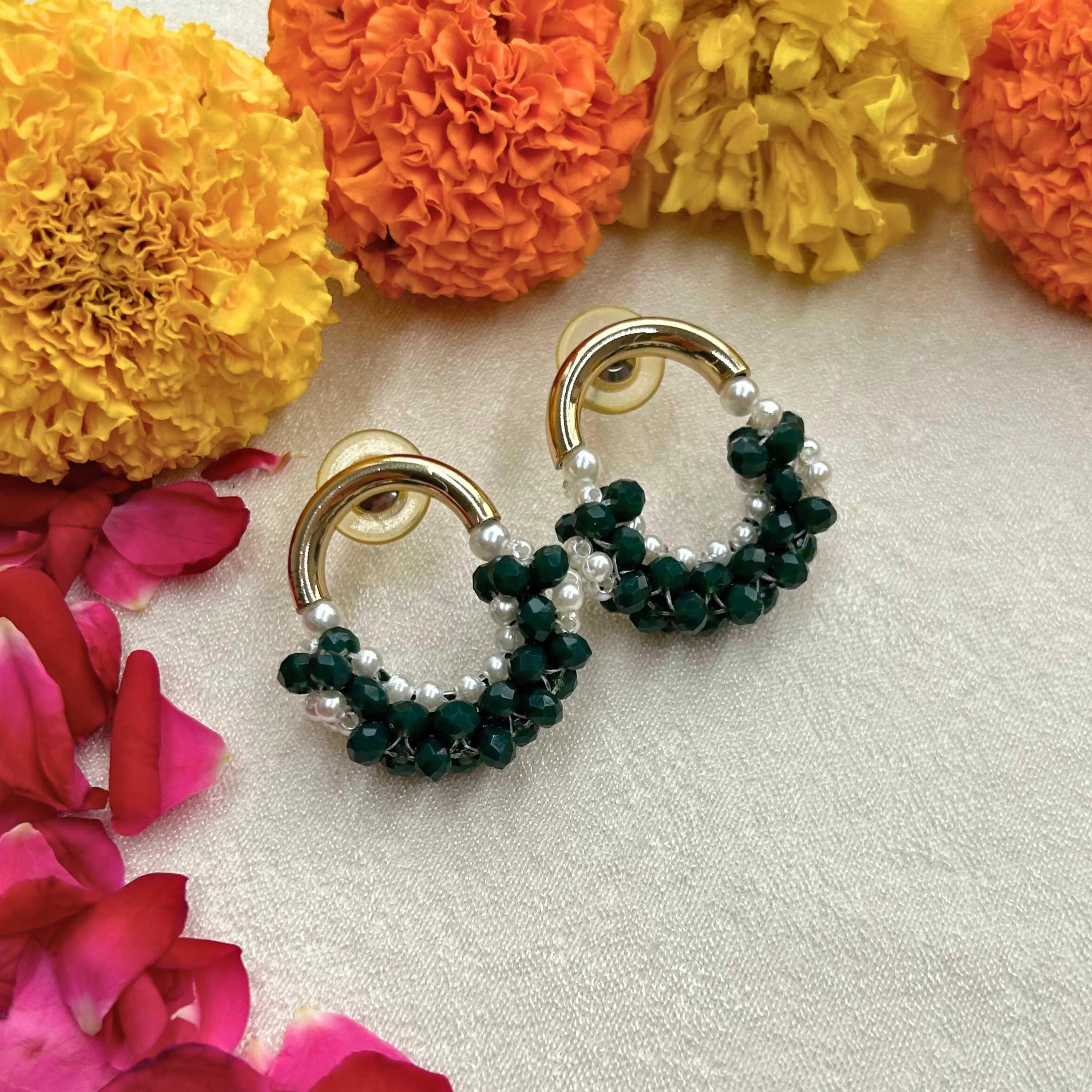 TFC White Pearl & Green Stone Mesh Gold Plated Earrings- Discover daily wear gold earrings including stud earrings, hoop earrings, and pearl earrings, perfect as earrings for women and earrings for girls.Find the cheapest fashion jewellery which is anti-tarnis​h only at The Fun company