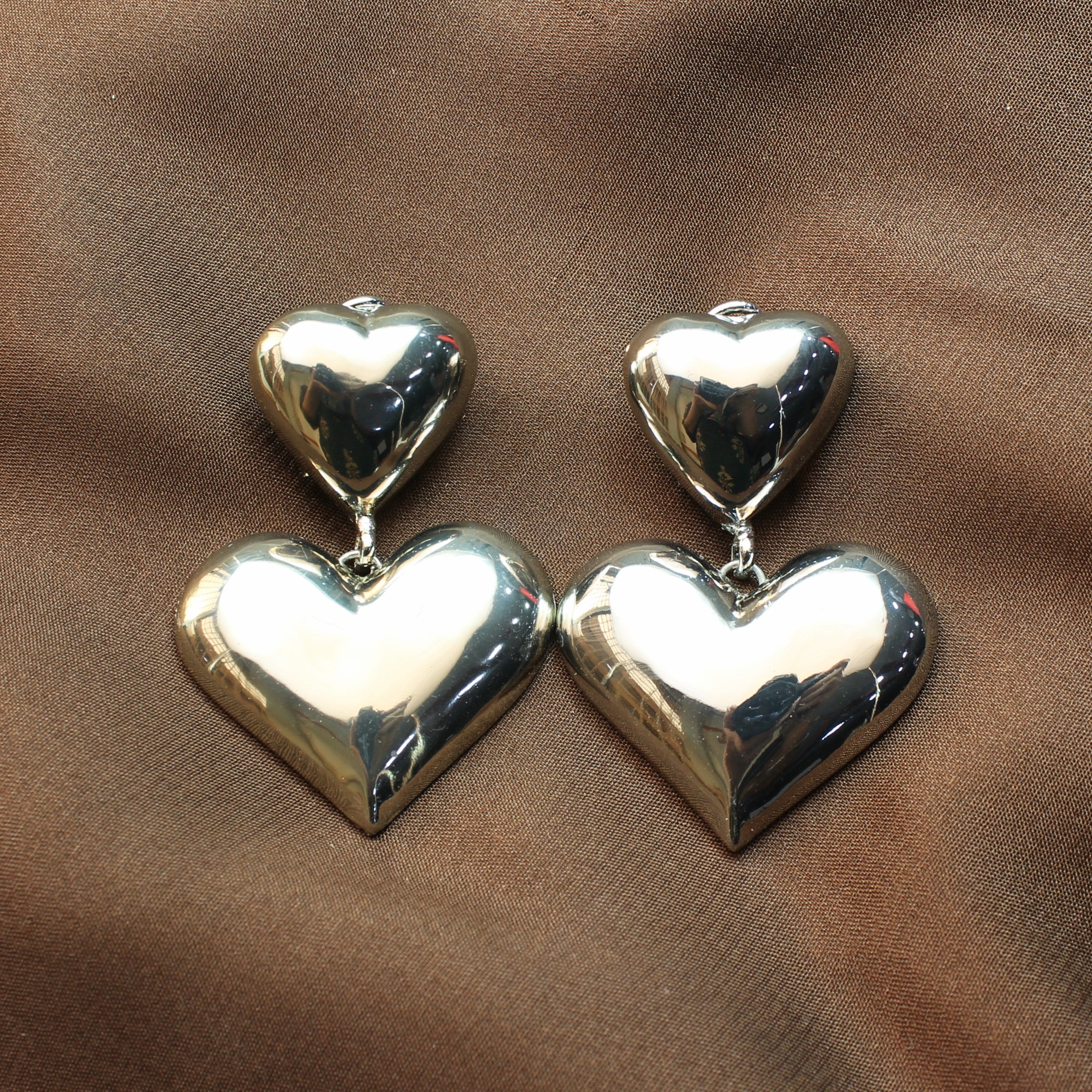 TFC Bold Double Heart Silver Plated Dangler Earrings