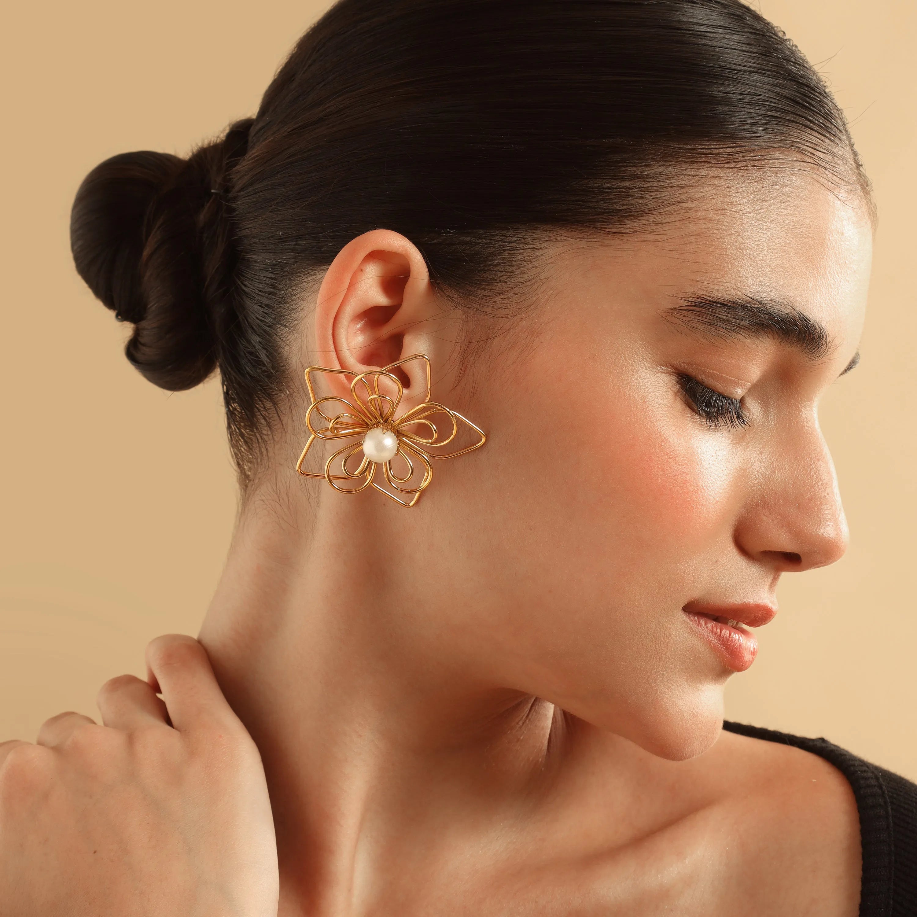 TFC Festive Flower Pearl Statement Gold Plated Stud Earrings-Discover daily wear gold earrings including stud earrings, hoop earrings, and pearl earrings, perfect as earrings for women and earrings for girls.Find the cheapest fashion jewellery which is anti-tarnis​h only at The Fun company.