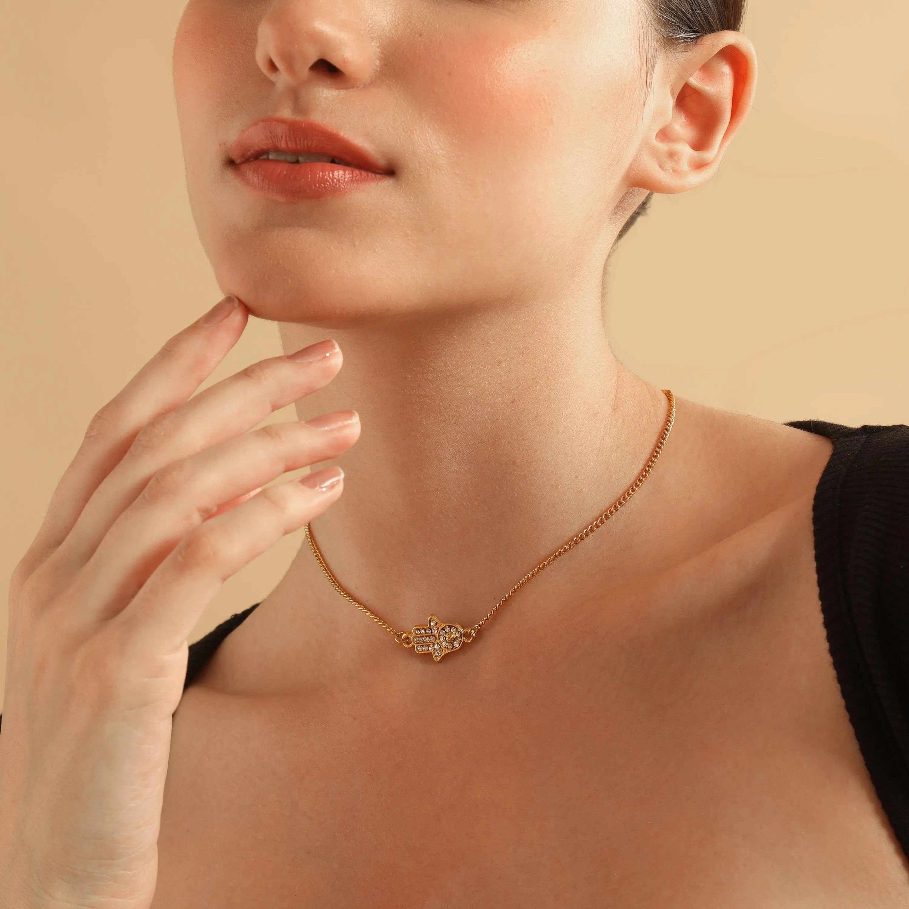 TFC Hamsa Gold Plated Pendant Necklace-Enhance your elegance with our collection of gold-plated necklaces for women. Choose from stunning pendant necklaces, chic choker necklaces, and trendy layered necklaces. Our sleek and dainty designs are both affordable and anti-tarnish, ensuring lasting beauty. Enjoy the cheapest fashion jewellery, lightweight and stylish- only at The Fun Company