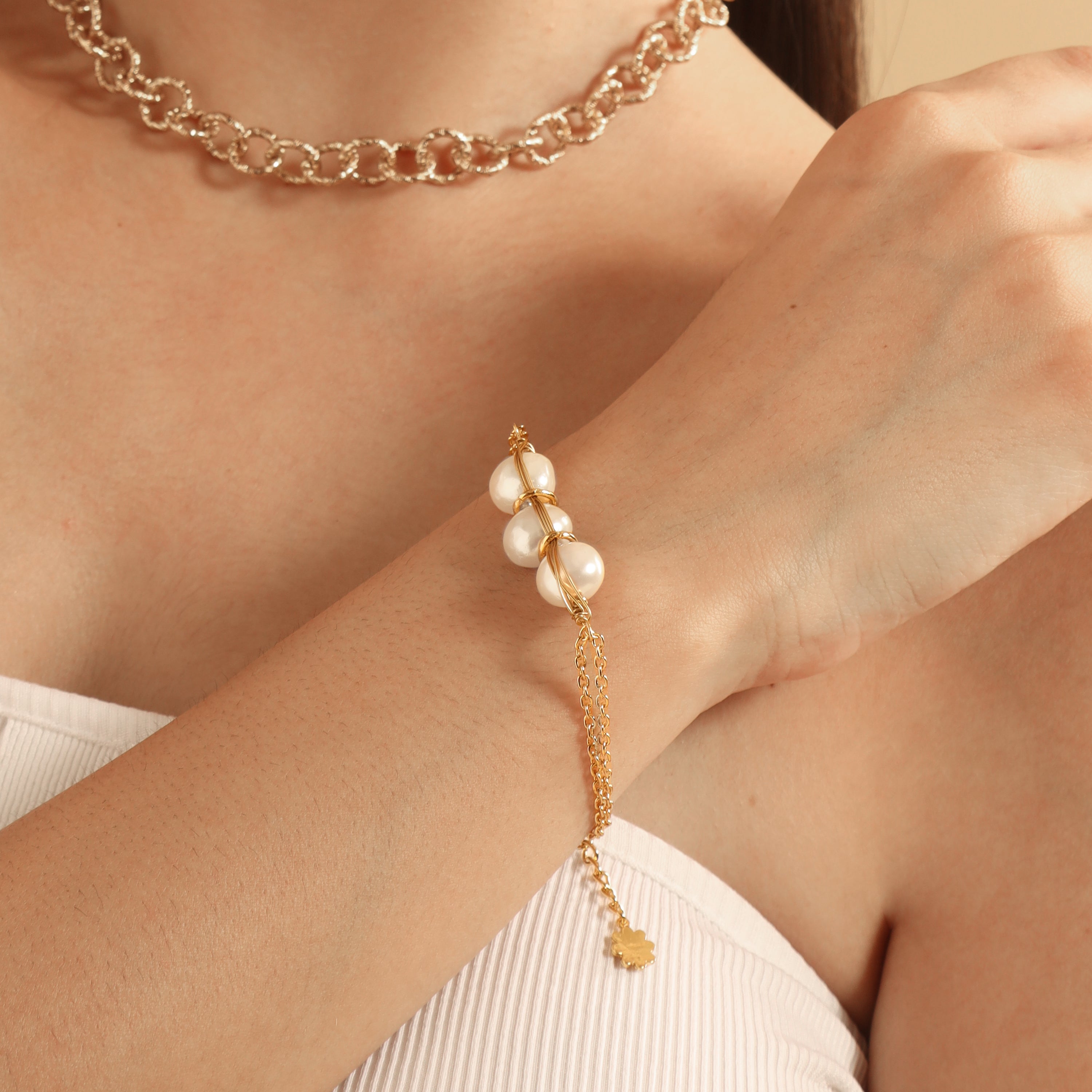 TFC Pearl Charm Gold Plated Bracelet-Discover our stunning collection of stylish bracelets for women, featuring exquisite pearl bracelets, handcrafted beaded bracelets, and elegant gold-plated designs. Enjoy cheapest anti-tarnish fashion jewellery and long-lasting brilliance only at The Fun Company