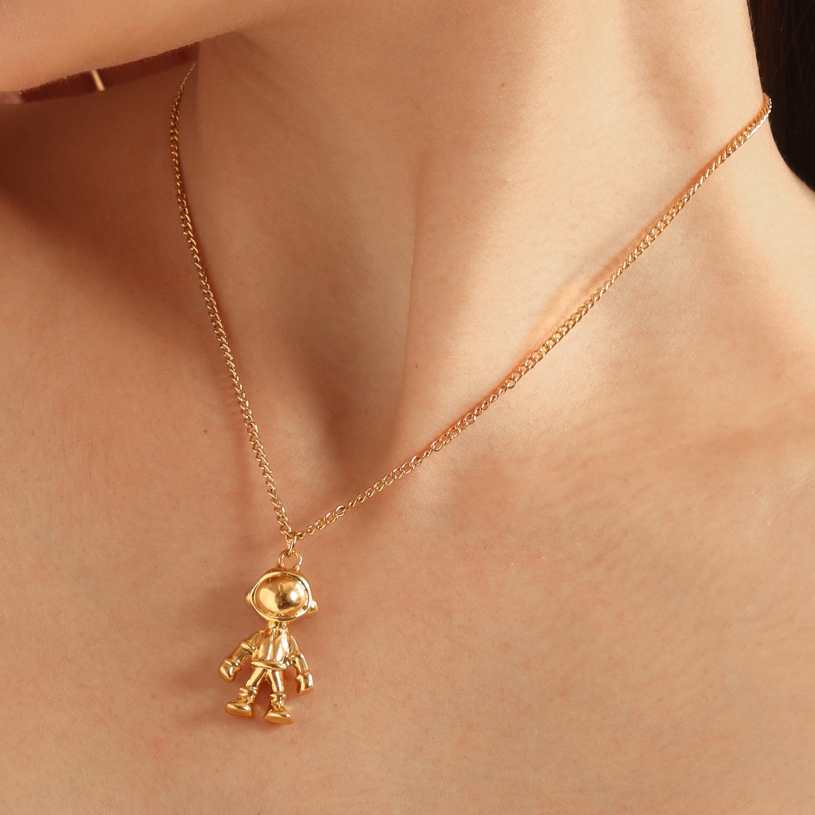 TFC Spaceman Gold Plated Pendant Necklace-Enhance your elegance with our collection of gold-plated necklaces for women. Choose from stunning pendant necklaces, chic choker necklaces, and trendy layered necklaces. Our sleek and dainty designs are both affordable and anti-tarnish, ensuring lasting beauty. Enjoy the cheapest fashion jewellery, lightweight and stylish- only at The Fun Company