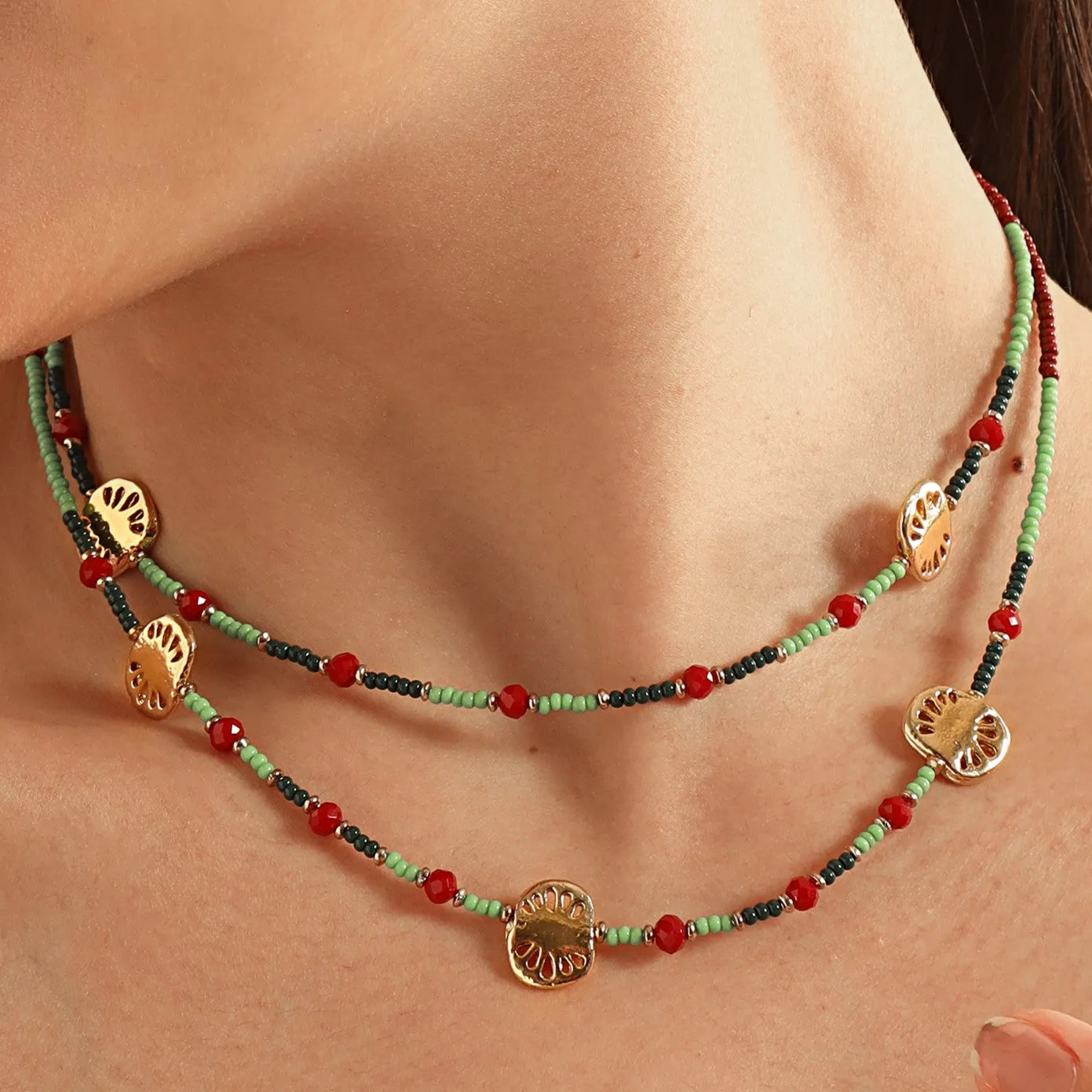 TFC Green and Red Beaded Layered Necklace-Enhance your elegance with our collection of gold-plated necklaces for women. Choose from stunning pendant necklaces, chic choker necklaces, and trendy layered necklaces. Our sleek and dainty designs are both affordable and anti-tarnish, ensuring lasting beauty. Enjoy the cheapest fashion jewellery, lightweight and stylish- only at The Fun Company