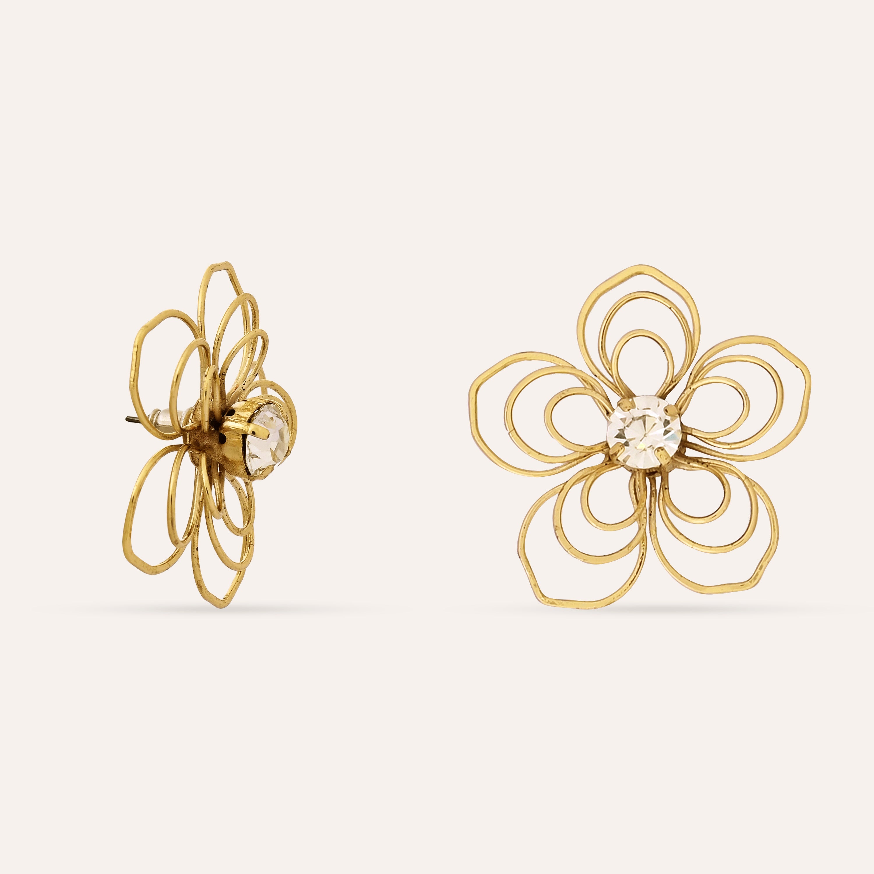 TFC Flower Power Gold Plated Stud Earrings- Discover daily wear gold earrings including stud earrings, hoop earrings, and pearl earrings, perfect as earrings for women and earrings for girls.Find the cheapest fashion jewellery which is anti-tarnis​h only at The Fun company.
